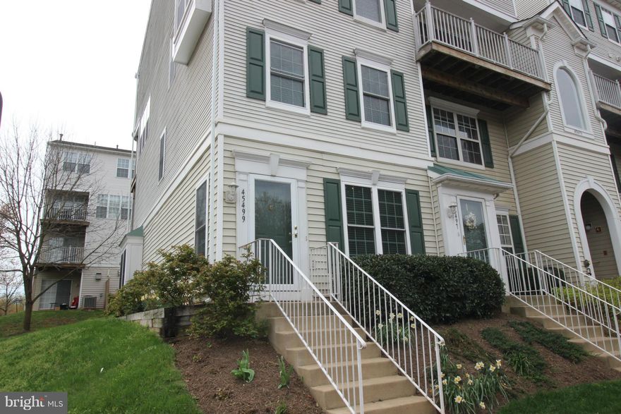 Ideal location! Close to 28, DullesAirport/Toll Rd, & Dulles Town Center shops. 2MBR/2.5BA end unit condo w/ great upgrades. Newer SS apps, new carpet, new HW floors in LR/DR, new windows, updated lighting t-out, newer HVAC/water heater. 2MBR suites w/ full BA. Amazing MBR glass shwr, custom WIC, & covered balcony. Open LR w/ gas FP & patio. BR lvl laundry. Ample parking. Water included. Must see!