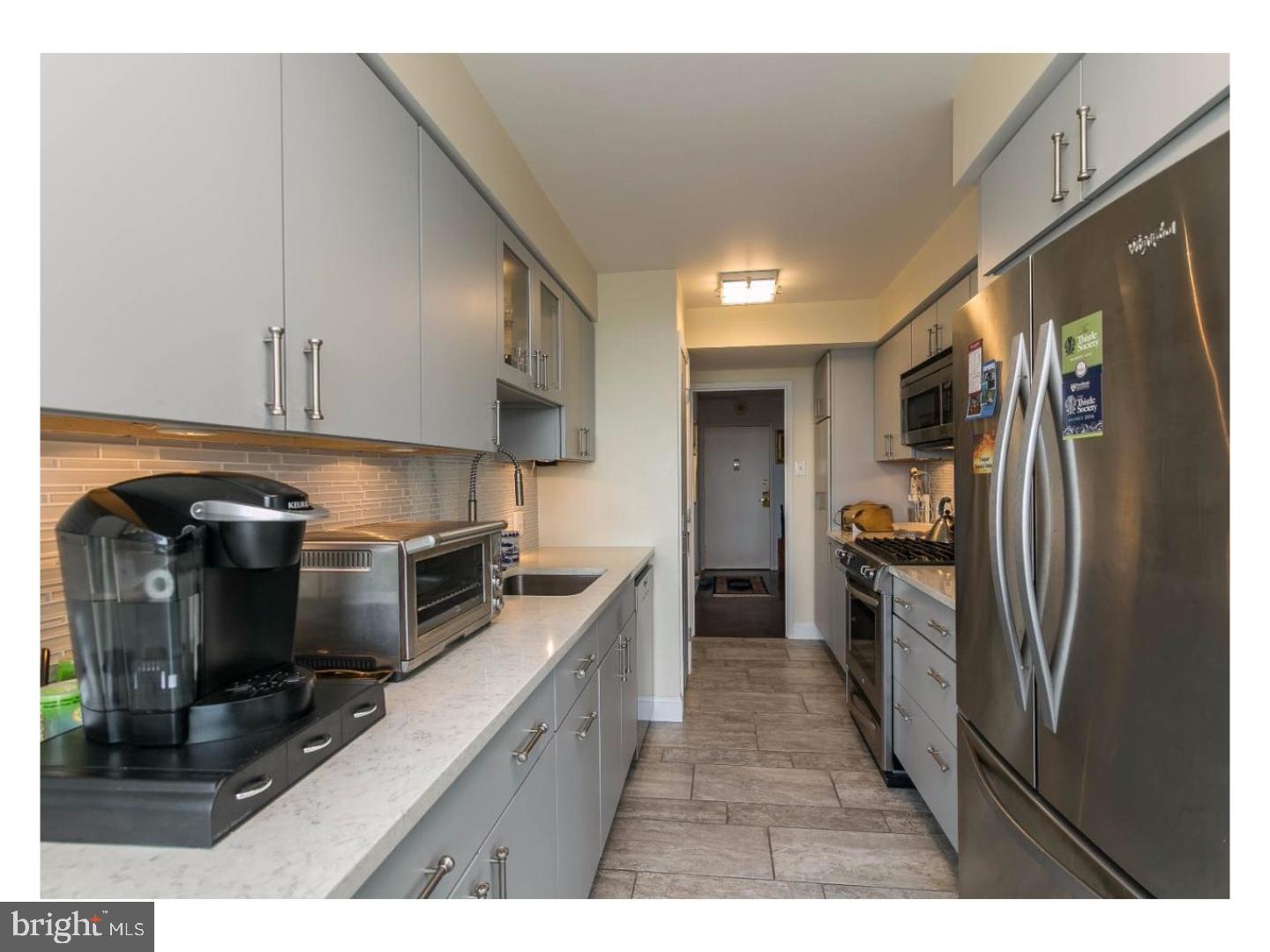 Three bedroom home with magnificent Center City & Art Museum views! Three bedroom, two and a half bathroom with magnificent 270 views of the Center City skyline and Art Museum. The dining room and living room are open and have walls of floor-to-ceiling windows. There is an expansive balcony accessible from the great room with jaw dropping views of the Center City skyline, Benjamin Franklin Parkway, and Art Museum. The designer kitchen has been modernized with granite countertops, a glass tile backsplash, stainless steel appliances, a breakfast bar, under cabinet lighting, Miele dishwasher, and pantry and wall cabinets with sliding pullout wood shelves. The master suite has a dressing area, with a wall of oversized windows boasting eastern and Center City views, two closets, and ensuite bathroom undergoing renovation. The second and third bedrooms both have oversized windows and large wall closets with built-in storage, and the latter features track lighting. There is an updated hall bathroom with a walk-in shower with a pebble stone mosaic floor, subway tile backsplash, and Kohler fixtures. Additional highlights include an energy efficient stackable Asko washer and dryer, walk-in storage closet, and hardwood floors in public spaces. The Philadelphian has often been called a "city within a city" due to its many services and amenities that are offered to residents. From a restaurant to a grocery store, multiple medical offices to a beauty parlor, residents of The Philadelphian will rarely need to travel far to accomplish their daily routine. When the need should arise to leave the premises, the building offers a shuttle bus that runs all day long dropping off and picking up residents throughout Center City. Residents also enjoy a 24 hour doorman, indoor and outdoor pools, and fitness center.
