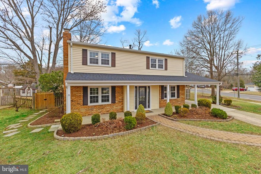 Welcome to 8031 Lynnfield Drive, a beautiful updated corner colonial in Alexandria's Williamsburg Manor North neighborhood. This charming home offers 4 spacious bedrooms upstairs, 3 full bathrooms, and a finished basement with a bonus room and flex space—ideal for a home office, entertainment area, or even a 5th bedroom! Recent upgrades include a remodeled kitchen with Samsung stainless-steel appliances (2021) and a custom coffee bar in breakfast room by Closets by Design (2024), new wood floors throughout the main level (2021), a newly added full bathroom in the lower level (2021), custom closet systems in all bedrooms (2023), and fresh paint throughout!

The main level showcases wood flooring, recessed lighting, and a cozy wood-burning fireplace in the living room. The sunny yellow kitchen features a breakfast area and additional pantry space in the mudroom that includes laundry and 2nd refrigerator with easy access to the carport. Upstairs, all 4 bedrooms include built-out closets, ceiling fans, room-darkening shades, and hardwood floors beneath the carpet. Outside, the fully fenced backyard is a private oasis with a spacious hardscaped patio, a shade-providing pergola with bistro lights, mature trees, landscaping and gardening shed.

Major system updates include a new hot water heater (2023), HVAC (2016), roof (2021), windows (2012), electrical panel (2017), and preventative basement waterproofing with a sump pump (2021). This move-in-ready home is conveniently located minutes from local attractions such as Hollin Hall Shopping Center, Sherwood Regional Library with its seasonal Farmers Market, nearby playgrounds and parks, and the scenic GW Parkway bike and walking trails!