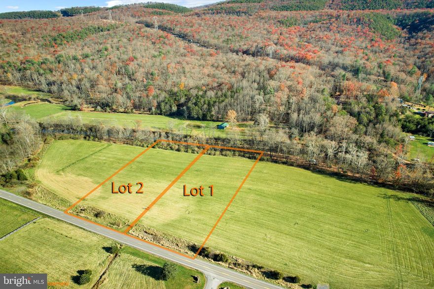 Two Beautiful lots totaling 5 acres with gorgeous mountain views, and water front access. 
Bredimus Subdivision located close to Corridor H and Baker WV. Easy access from Winchester VA via Rt 29 & Rt 50. BUYERS ARE ADVISED: to verify all documentation with Hampshire County Health Dept . Building & Zoning to determine they are able to do what they want to do with property.  Verify flood zone information it may have changed. from completion date of surveys.   Lot corners have been flagged and staked with lot numbers.