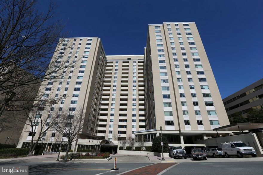 Lovely updated 1 BR 1BA w/ BALCONY w/ treed views. Indoor  GARAGE SPACE AND ALL UTILITIES ARE INCLUDED. Wood floors, washer/dryer  walk-in closets Extremely well managed building w/ 24 hr. desk, party room. indoor  pool, gym, saunas. Walk/ride shuttle to Metro, Whole Foods, shops & entertainment. Available immediately.