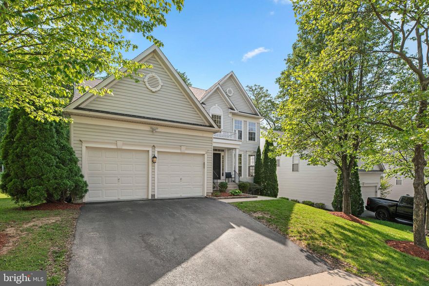 Sellers will entertain back up offers. Please have best and final offers in by 6pm Friday July 11th. Welcome to this meticulously maintained, spacious Colonial offering over 4,000 square feet of finished living space, perfect for multi-generational living!  This home boasts  4 bedrooms, 3.5 bathrooms, and a fully finished walkout basement with an in-law suite. This home truly has it all! The first floor flows seamlessly with a two story foyer, natural hardwood flooring, formal living & dining rooms, a large kitchen with ample 42" hardwood cabinetry, center island, Silestone countertops and a Stainless Steel appliance package. Just off the kitchen there's a large Solarium which is great for large gatherings and a large family room which is equipped with a wood burning fireplace.  Outside the Solarium there is a large deck which is great for entertaining.  A first floor office and or flex space, laundry room and a half bathroom complete the first level of this home.  On the 2nd level, the large owner's primary suite has a vaulted ceiling, two large walk in closets and a large sitting room! The owner's  bathroom suite has a large tranquil soaking tub with a separate shower and dual vanities. Three generous size bedrooms and hallway bathroom with a double vanity complete the 2nd floor. Downstairs in the finished basement you will find a second kitchen with an eat in area, a large entertainment room equipped with an included 4k projector, sound bar, projector screen & built in speakers. There is a second laundry room, full bathroom with a large soaking tub, a large room which is currently being  used as a fifth bedroom, an additional  room which could be used as a flex or office space as well as two large storage rooms & walk-out basement stairs. The owner's recently had the lush tree-lined rear yard completely enclosed with privacy fencing. There is a tree conservation area directly behind the property so no one can build behind you.  This home is conveniently located in the Howard County School district, close  to all major routes & shopping, convenience stores, several area malls and is within minutes from BWI airport. This sale includes a one year CINCH home warranty! Schedule your showing today so you don't miss out on this spectacular home!