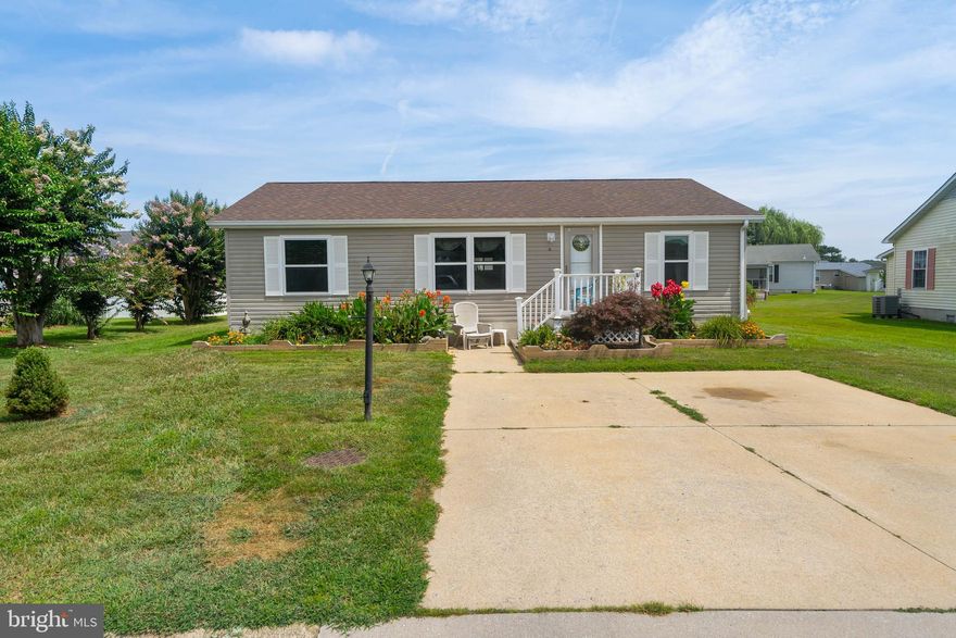 Offering the ease of single-level living, this 3-bedroom, 2-bath Class C manufactured home is set on a permanent foundation in the desirable Mystic Harbor community of Berlin. The layout provides comfortable everyday living, while a large canopy on the back deck creates a shaded space to relax or entertain. Neighborhood amenities include a community pool, playground, sport court, clubhouse, and boat/RV storage for homeowners. The homeowners association handles grass cutting, snow removal, trash pickup, and common area maintenance, allowing for a low-maintenance lifestyle. All of this is just a short drive from Historic Berlin, Ocean City beaches, and Assateague Island National Seashore.