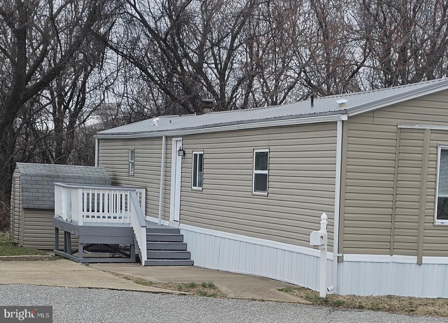 Spacious and bright two bedroom, two bath manufactured home on lot in tranquil Liberty Mobile Home Park, located in eastern Baltimore County. Own for less than rent. Sorry, no dogs in the community.
Home has recently been renovated, to include: all new kitchen appliances; new HVAC system; new flooring; new light fixtures and ceiling fans; new mini blinds; freshly painted; newer windows. Home also has washer and dryer, plus ample closet space, and plenty of natural light. Outside the home, there is a large deck and a concrete patio for enjoying summer evenings. Parking for two vehicles - one is a parking pad on the lot, and the other is directly in front of home on the street. Pad rent is $800 per month. Tenant is responsible for all utilities, including gas, electric, water, sewer, and cable/internet. Pad Rental Details & Mobile Home Park Application Information: All prospective tenants/purchasers of mobile homes and anyone who wishes to reside in the community must first make a written application with the park
management and pay $30 per adult applicant. Application fee includes credit and criminal check. Minimum credit score is 680 and minimum income is $55,000. Additional parking available for third vehicle or commercial vehicle at $40/month. Twelve-month lease. Security deposit is one month of rent with a
written home inspection by licensed inspector; otherwise, security deposit is two months' rent. Sorry, no dogs in the community. Community is close to Johns Hopkins Bayview, Franklin Square, several Amazon
distribution centers, Martin Marietta, and others employers. Nearby shopping, movies, groceries, places of worship. Convenient to I-695, I-895, and I-95, and 5 miles to Baltimore City, 10 miles to White Marsh, 25 miles to Towson and Aberdeen Proving Ground.