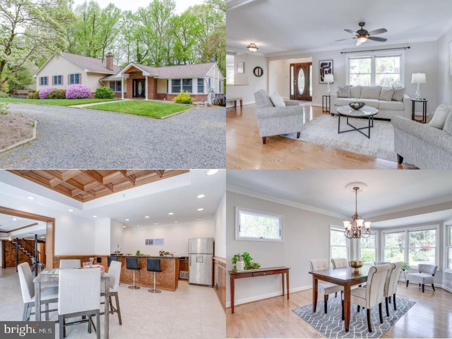 Exceptional Entertainer’s Dream in the Sought-After Mantua/Frost/Woodson School Pyramid!

Welcome to this beautifully upgraded home that blends luxurious comfort with practical functionality—all located at the end of a cul-de-sac with plenty of privacy. 

The heart of the home is a stunning gourmet kitchen, thoughtfully designed for both everyday living and entertaining. It features high-end appliances, a center island with a cooktop, two separate ovens, a built-in microwave on the island, granite counters and abundant counter and cabinet space. Just off the kitchen, step out onto your low-maintenance Trex deck, perfect for summer gatherings or quiet mornings overlooking the spacious, fully fenced backyard.

The main level layout is open and provides a flexible design with space for living, dining, working, etc.  A few steps up from this level  are  three spacious bedrooms each with extra large closets, including a generous primary suite with a huge walk-in closet and a luxurious ensuite bath featuring a large jacuzzi tub and separate shower—your private retreat.

Downstairs, the finished walkout basement is truly a destination in itself. It boasts a custom 12-foot oak bar complete with a stainless steel sink, garbage disposal, and full-size stainless steel refrigerator. The bar area is enhanced by 10-foot ceilings and a 12x12 custom oak coffered drop-tile ceiling, all wired for dual TVs and surround sound, making it the ultimate spot for entertaining or relaxing in style.

The basement family room centers around a wood-burning stove set on a custom stone hearth—not only cozy but powerful enough to heat the entire home. It’s also pre-wired for a premium entertainment or surround sound system. This level also features a fourth bedroom and a flexible den or office space, ideal for guests or working from home.

The 25x35 garage which can house four cars is a rare find with 10.5-foot ceilings, new epoxy flooring (2025), and advanced wiring including 12 Cat-3 voice lines and 8 Cat-5e internet lines, making it ideal for a workshop, studio, or high-tech workspace. It also includes a 12x8 utility/storage room. Access to the garage is located around the back of the home, allowing for a clean curb appeal up front.

And speaking of parking—you’ll never run out of space. With a front driveway, side parking, and rear access to the garage, the property offers enough room to comfortably accommodate up to 15 vehicles—a rare luxury in this area!

The location is ideal with access to shopping, restaurants, trails, parks, and all the major commuter routes, including blocks to the Metro bus! This home offers the perfect blend of elegance, technology, space, and location—don’t miss the opportunity to make it yours.