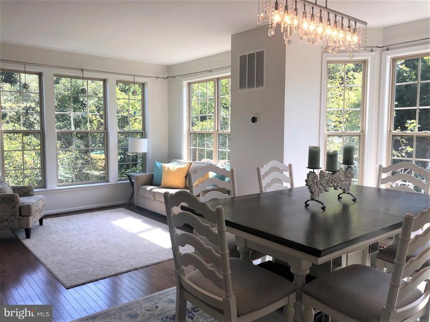 Stylish Living in Historic Occoquan!  This brick front, 3 story, end unit townhouse with 2 car garage offers so many of the upgraded features that you have been looking for.  The main level features hardwood floors, high ceilings and lots of windows with views of nature.  The kichen has granite counter tops, kitchen island, gas cooking, stainless steel appliances, pantry and steps out to the rear deck.  The nook off the kitchen offers a gas fireplace.  The living/ dining room areas are nice and spacious with a convenient powder room.
The upper level offers 3 bedrooms and 2 full baths.  The primary bedroom has a walk-in closet, ceiling fan and full bath with soaking tub & separate shower.  There is good closet space in bedrooms #2 & #3.  The He washer & dryer and efficient tankless gas hot water heater are located on this level.  
Downstairs, there is a cute den/ rec room/ 4th bedroom area with full bath.  This room also has a view of nature and offers a perfect get-away for a home-office.  The 2 car garage with expoxy finished floor is super for the car enthusiast.  There are 2 additional parking spaces in the concrete driveway behind the garage.
No cats. Small dogs less than 40lbs, 2-10 years old with pet reference, pet deposit & pet rent.
Vistas at Occoquan is a small neighborhood of just 8 homes located in the historic old town of Occoquan.  There is visitor parking on site & street parking.  Residents enjoy strolling to the various shops and restaurants and to the waterfront park in Occoquan.