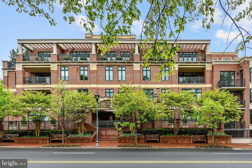 Light-filled luxury Penthouse in boutique building in the heart of Bethesda.Unit features 2 huge private terraces, open floor plan, high ceilings, hardwood floors & stylish finishes. Living room with fireplace, gourmet kitchen,large master suite w/ walk-in closet, ample guest room,separate den.Better than new construction.2 parking spaces, extra storage.Walk to everything.