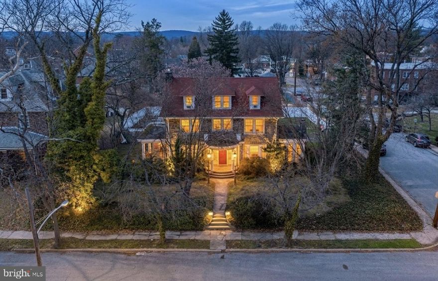 Stately detached home on a prominent corner lot, featuring an inviting in-ground pool, perfect for entertaining or unwinding. Mature landscaping and thoughtful plantings provide both privacy and strong curb appeal.   
 
The front entrance makes a lasting impression with classic columns and a graceful curved staircase. Inside, the first floor offers a spacious layout with a living room, dining room, enclosed porch with French doors, kitchen, and a convenient half bath.  The second level includes three generously sized bedrooms and two full bathrooms. The third floor provides additional flexible living space filled with natural light—ideal for a home office, guest rooms, or creative use. 
 
This property is being sold strictly as-is and will require an owner with vision who is ready to give it the attention it deserves.  Whether you’re an investor or a buyer looking to create your dream home, this is a rare opportunity to add value and build equity in a standout property.