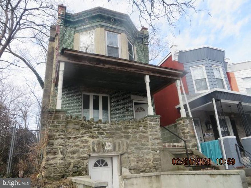 Two story, porch front, fully detached single. Ready for your finishing touch. Front living room with hardwood floors, separate dining room, powder room, large kitchen with wood cabinets and granite countertops all on the first floor. Three nice sized bedrooms with hardwood floors and ceiling fans plus full modern bathroom on the 2nd floor. Large basement with full bath. Property is located on a nice sized lot with nice sized rear yard.  Conveniently located just oof of Belfield Ave and close to Broad Street.