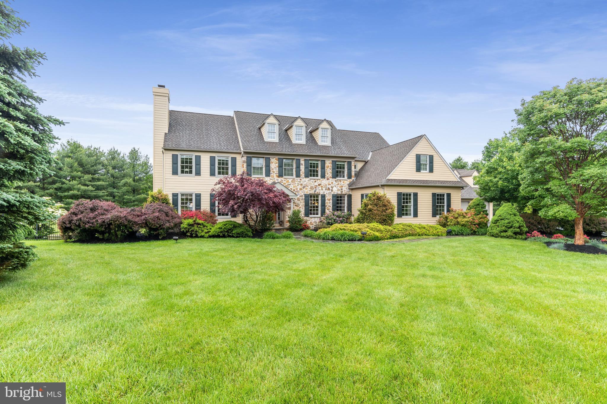 Imagine going over a covered bridge every day as you head out to work or activities! 1860 Covered Bridge Rd is located on a gorgeous 4 acres parcel with a beautiful pool, spa and pool house in back, a 6 car garage, and is within easy walking distance to Valley Forge Park and all of their wonderful walking trails and hikes! This gorgeous, custom, builder's home has beautiful millwork and detail throughout, gleaming hardwoods, a wonderful open floor plan plus many upgrades and attention to detail you would expect to find in a builders own home! With a stone and cement siding exterior, you have no worries about stucco! A stunning 2 story entry hall welcomes you with the living room with gas fireplace to the left and dining room with beautiful wainscoting to the right - both with beautiful wood floors and moldings. The chef's kitchen with custom cabinets, Subzero and Bosch stainless appliances, large island/breakfast bar, and granite tops, is open to the breakfast room and the stunning family room with stone gas fireplace, huge windows, beautiful built-ins and great views of the pool and property. There is also a den/office, half bath and laundry on the main level. Upstairs you will find the expansive master bedroom suite with sitting room, new custom bath with beautifully tiled frameless shower, Grohe Body Spray System, two vanities with lots of storage cabinets, radiant heat floors and a huge walk-in closet. There is also a princess suite on this floor along with two other bedrooms and a hall bath - plus a beautiful hallway with hardwoods and balcony overlooking family room and entry. The Lower Level will not disappoint and you may never want to leave!! Complete with media area where both the projection TV and screen stay with the house, a large workout room where the equipment can stay with house, a pool table, a ping pong table, an air hockey table - plus a desk for computer gaming - you certainly will not get bored!! The ceilings in the lower level are 8.5' tall!! Out back you will find the most gorgeous pool with hot tub and fountains, plus a pool house that has a kitchenette and half bath!! This house is the ultimate entertaining house but also perfect for every day living. Imagine the fun that can be had on 4 acres of land - horses, minibikes, ATV's, add a tennis court - you name it!! With an end of cul de sac location and close proximity to Valley Forge Park, the location of this home combines the privacy you want, with the convenience of being approx 5 minutes to major highways and great shopping. Truly the best of both worlds! And as an added bonus, it is in Top Ranked Tredyffrin Easttown School District - Valley Forge Elementary! Check out the video at https://vimeo.com/422159034 - you won't be disappointed!