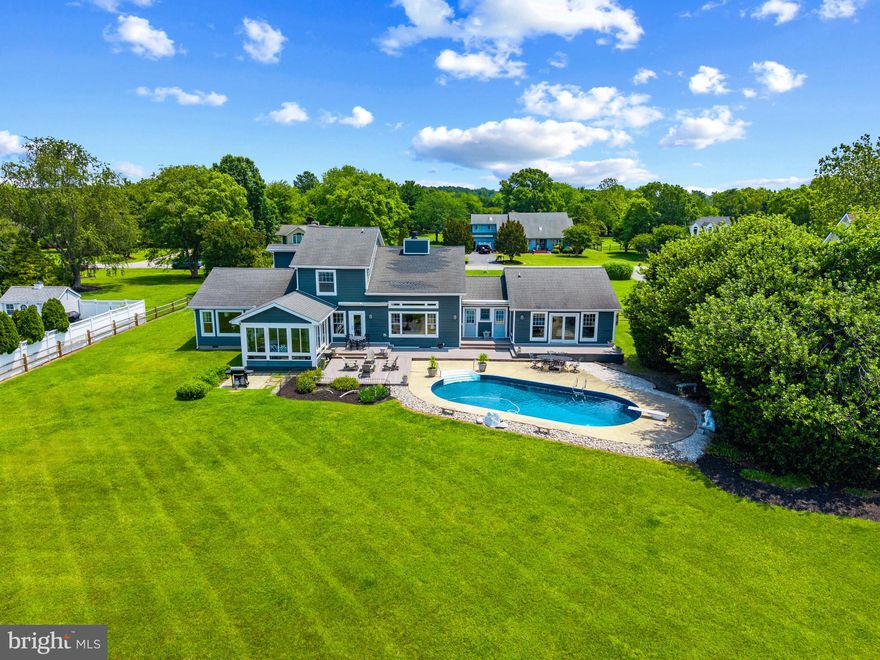 Welcome to your dream waterfront retreat in the sought-after golf community of Prospect Bay. Perfectly situated on a beautifully landscaped one-acre lot, this exceptional home offers the best of Eastern Shore living with resort-style amenities and breathtaking views.

Step inside to discover a thoughtfully designed layout featuring a main-level primary suite, ideal for comfort and convenience. The heart of the home is a stunning great room with soaring arched ceilings and panoramic views of the water. The four-season room off the kitchen is the perfect spot to watch the sunset over the Bay. There is an additional living room off the kitchen perfect for social gatherings or relaxing in front of the large water-oriented windows. The multiple living and entertaining areas flow seamlessly, offering both elegance and flexibility for everyday living and special occasions.

Upstairs, you’ll find three spacious guest bedrooms. The home also includes a walk-in pantry, multiple access points from the attached two-car garage, and a pool room complete with a full bath, ideal for indoor-outdoor entertaining. Enjoy the best of waterfront living with a private pier, expansive deck, and a waterfront pool—all designed to maximize your enjoyment of the serene surroundings.

Located within the exclusive Prospect Bay Community, residents enjoy access to a wealth of amenities including an 18-hole golf course with pro shop, tennis and pickleball courts, a members-only clubhouse with restaurant and bar, community pool, playground, private boat launch, and more.

Whether you're seeking a full-time residence or a weekend escape, this waterfront property offers an unmatched lifestyle in one of Maryland's most prestigious communities.