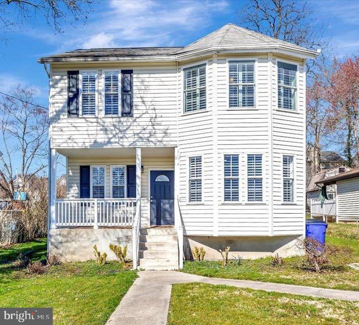 Welcome to High Ridge Park! Looking for a well-maintained home that is move-in ready in Laurel? This is it! This 4-bedroom, 4-full bath (yes, that is correct) was fully renovated to expand the footprint of this charming home in 2013. In addition to doubling the square footage, the original bay windows were duplicated on the second level to maintain the home’s original exterior charm. This lovely home immediately welcomes you with a pleasant front porch. Amenities include hardwood floors on the main level, plantation shutters throughout, wainscoting, recessed lighting, crown molding, galley kitchen with ample dark wood cabinets, granite countertops and stainless-steel appliances. Directly off the family room via sliding patio door you will a find large, level, maturely landscaped and partially fenced rear yard with endless possibilities. Upstairs you will find four generously sized bedrooms. Two of these bedrooms include private en suites with ceramic tile flooring. Do not miss the sleek, black hexagon floor tiles! This centrally located gem is in the heart of Howard County. Not only will you have easy access to the area’s quintessential Main Street but also to I-95 for a short commute to Ft. Meade, DC or Baltimore. The MARC station is also less than 2 miles away. With over 2,100 sq feet of finished living space, your family will not outgrow this home any time soon! This is the perfect home for you so hurry and schedule your appointment today!