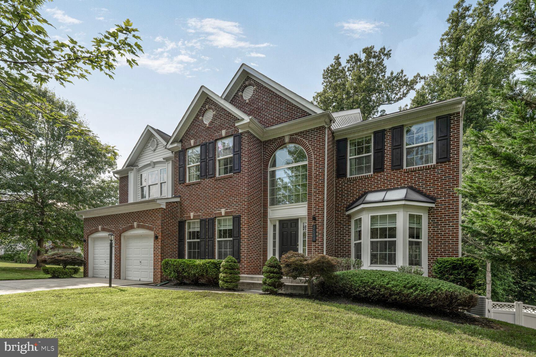 Welcome home to this 6 bedroom, 3.5 bath colonial with 2 car attached garage on a quiet cul-de-sac in the tight-knit community of Rose Valley! Perched on a private lot, this brick-front marvel is a testament to spacious living interwoven with intimate charm, creating an idyllic setting for both family life and entertaining. A grand two-story foyer, bathed in natural light, unfolds into a thoughtfully designed floor plan. To the left, a home office space with double door entry offers a peaceful retreat for work or study. To the right, a formal living room with bay window is followed by a formal dining room. Step from the dining room to a totally renovated open kitchen with quartz counters, marble tile backsplash and stainless steel appliances, all opening to a large breakfast room and family room with gas fireplace. Glass doors lead from the breakfast room to a back deck overlooking a fully fenced back yard. From the family room, an adjoining sunroom provides a peaceful nook with loads of natural light for tranquil mornings or leisurely afternoons. Upstairs find a primary suite with 2 walk-in closets and a luxurious bath while 4 more bedrooms down the hall share a hall bath. The upper level is completed by a conveniently located laundry room. The fully finished lower level features a spacious rec room with rear walk-out, guest bedroom, full bathroom plus two bonus rooms — one fashioned as an office and the other a flexible workout space. All this just blocks to Rose Valley Park with easy access to Hwy 210 and I-495 and moments to National Harbor shops, dining and entertainment!