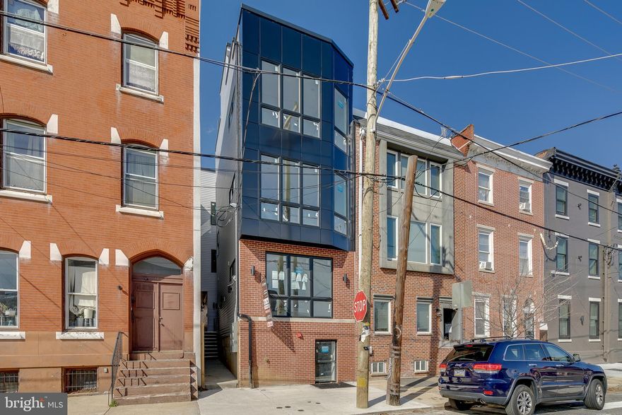 Fully Leased! Perfect investment opportunity for a new construction multi-family on a prime block of Francisville, one block from Fairmount Avenue. This building is only 1-year old with all the modern amenities and includes a full 10 year tax abatement! Each of these large units features a designer kitchen, stainless steel Samsung appliances and big living rooms. Units 2, 3, & 4 have two bedrooms and two full bathrooms. Unit 1 is a 1 bed, 1.5 bath. All units have in-unit laundry.  Three of the residences include private outdoor space. The two penthouse units have private roof decks with stunning, unobstructed skyline views. The rear lower-level has a large rear yard. Come and tour! *Photos are from previous vacancies*