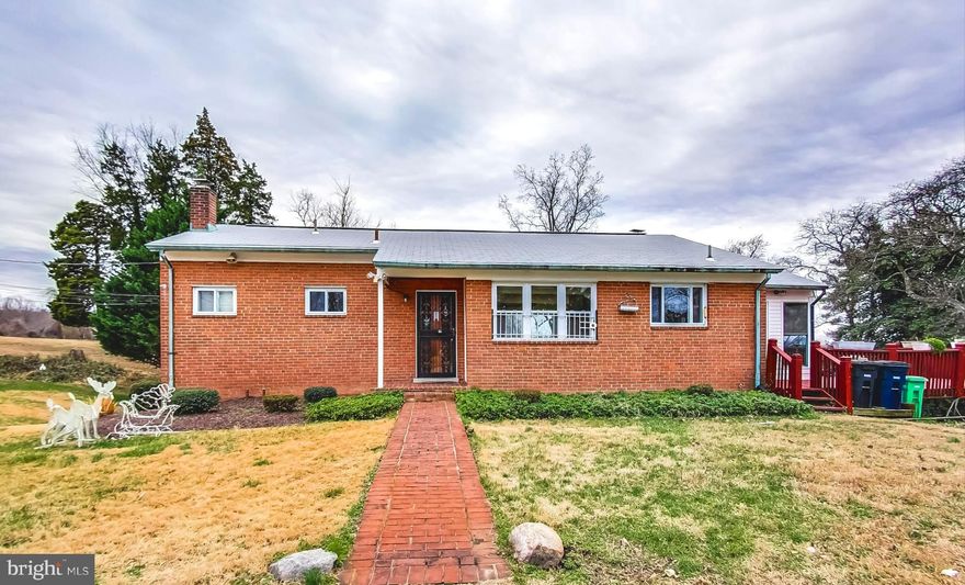 ACCEPTING BACK UP OFFERS. NO HOA...3 lots for the price of one, totaling a whopping 1.3 acres! Super long circular driveway and attached garage on the back of the home is perfect for the car enthusiast.  Main level living with a finished basement ,tucked away on a secluded lot with an open floorplan, enclosed porch ,two level deck and huge yard.  Perfect home for family get togethers.  Call today for a private showing!