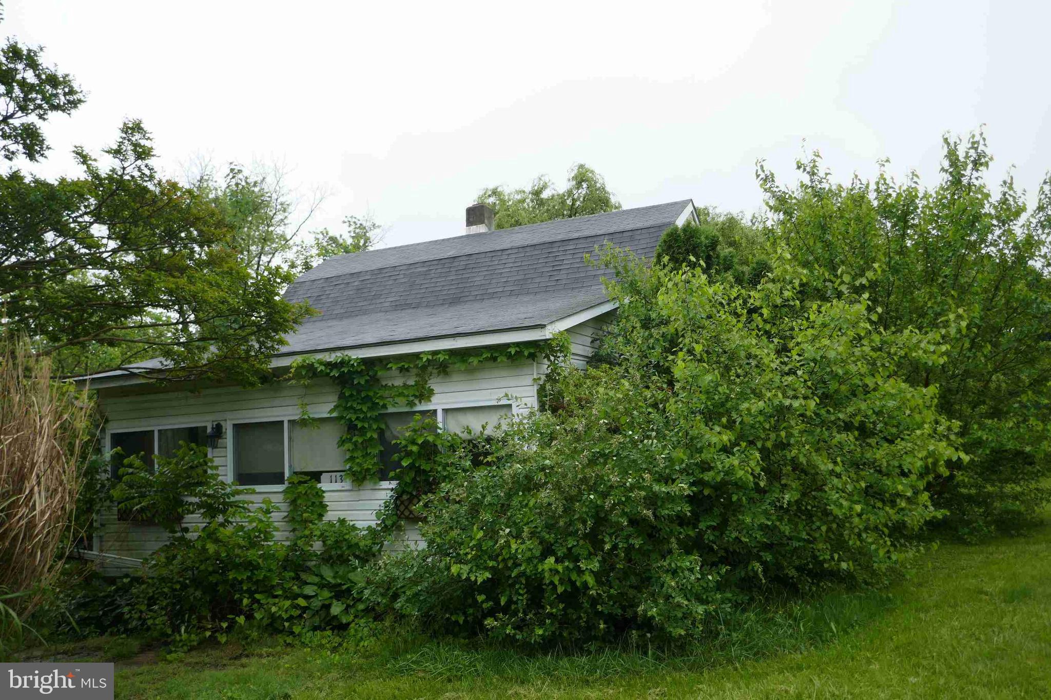 Discover the potential of this charming 2-bedroom bungalow, nestled on a generous 0.57-acre lot. Built in 1958, this detached home offers a unique opportunity for those looking to invest in a property with character and room for improvement. Property offers a front porch, a living and dining area, and a spacious kitchen just waiting for your creativity. Go up the second level and check out the 2 bedrooms! The expansive yard offers endless possibilities for landscaping or future enhancements. Embrace the chance to revitalize this bungalow and make it your own! Come and schedule your showings now!