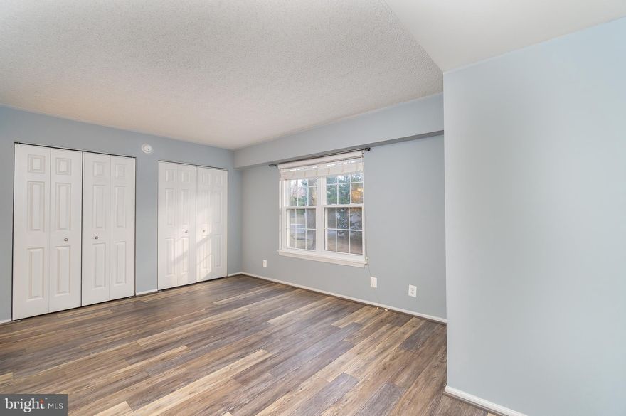 NEW PRICE IMPROVEMENT! Open house  -Sunday 4/20 from 2 pm to 4 pm.  Welcome home! Beautiful and spacious 2 Bedroom and 2 Bath condo in the private gated community of The Colonies.  Corner unit  - 1150 Sq ft.  Freshly painted!  Newer flooring .  Open floor plan.  Large rooms. Newly installed Quartz countertop and new stove. Updated bathrooms and windows in 2018.  A/C  was replaced in  2016.  Washer and Dryer in unit.  Covered one assigned garage parking and plenty of unreserved parking for residents and guests.  Elevator in building.  Extra storage.  24/7 secured entrance.   Wonderful amenities - Outdoor pool, fitness center, fitness trail, tennis courts, club house, pool tables, children's tot lot, picnic areas with grills and much more. Walk  to McLean Metro Station, Capital One Hall, Wegmans, Safeway and Restaurants.  Close to Tysons Corner,  Boro, shops, movie theater, bowling.  Easy access to I-495, I-66, Dulles Toll road and  GW Pkwy.