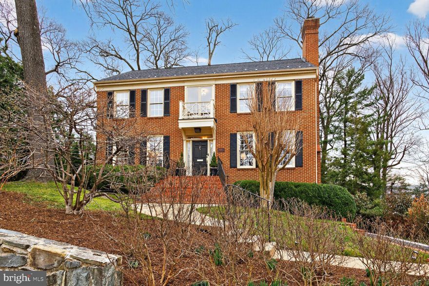 Elegant all-brick Colonial offering 5 bedrooms and 4.5 baths in an unbeatable location across from the Knights of Columbus, just two blocks to Yorktown High School and moments to neighborhood parks, shopping, and dining. * 

A welcoming exposed aggregate walkway leads to brick front steps and a covered entry. Mature landscaping beautifully frames the home, while the updated paver driveway guides you to a side-load two-car garage complete with built-in shelving and abundant storage. The private backyard backs to woods, offering peaceful tree-top views and wonderful outdoor living spaces including a relaxing deck, stone aggregate patio, and flagstone patio * 

Inside, the welcoming foyer features crown molding and updated lighting. Hardwood floors flow throughout the main and upper levels. The formal living room offers crown molding, a wood-burning fireplace with marble surround and wood mantle, recessed art lighting, and custom draperies. The formal dining room showcases fresh paint, crown molding, chair rail, and a new chandelier. * 

The open kitchen is beautifully appointed with granite countertops, undermount stainless steel sink, ceramic tile flooring, 42-inch white paneled cabinetry, recessed lighting, built-in desk, breakfast bar seating, and stainless steel appliances including a GE Café refrigerator, GE Profile dishwasher and double wall oven, and Jenn-Air gas cooktop. The adjoining family room features a brick wood-burning fireplace, built-ins, a hideaway wet bar with glass shelving, new lighting in the eat-in area, and French doors leading to the deck. A private home office with built-ins and crown molding and an updated powder room complete the main level. * 

Upstairs, the spacious primary suite offers cathedral ceilings, a wood-burning fireplace, two walk-in closets with built-ins, dressing area, and a luxurious spa bath with jetted soaking tub, glass-enclosed shower with bench and tile inlay, ceramic tile flooring, and private water closet. Three additional bedrooms include one with built-in desk and cabinetry and another with a renovated en suite bath. The updated hall bath features ceramic tile flooring and surround, new vanity, lighting, and fixtures. * 

The finished walk-out lower level includes a large recreation room with brick fireplace, recessed lighting, tall ceilings, guest bedroom with built-ins, updated full bath, and utility room with washer/dryer, utility sink, 75-gallon water heater, and Carrier gas HVAC (2023). Additional features include central vacuum and whole-house water filtration system. * 

This is a rare opportunity in a prime North Arlington location!