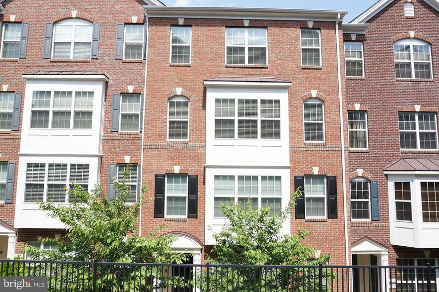 GATED COMMUNITY WITH UNMATCHED LUXUTY AMENITIES!  Truly amazing opportunity and move-in ready for new tenants. Over 2,200 SQFT of luxurious living space. 3 large size bedrooms and 2 full and 1 half bathroom. Beautiful wood flooring through out the main and upper level, with high ceilings and recess lights. Gourmet kitchen with granite counter tops and stainless steel appliances, Master bathroom with soaking tub, double vanities and standing shower. Garage parking and drive way for 2 cars. Gated community with indoor and outdoor pools, Playground, beautifully modern recreation center for parties, full size gym, and rock climbing wall. HOA/Condo fee is included in the rent. Water and sewer is also included. Close to all major shopping centers, including the popular Stonebridge Town Center, and Potomac Mills Mall. With in minutes to 95 and other major routes.