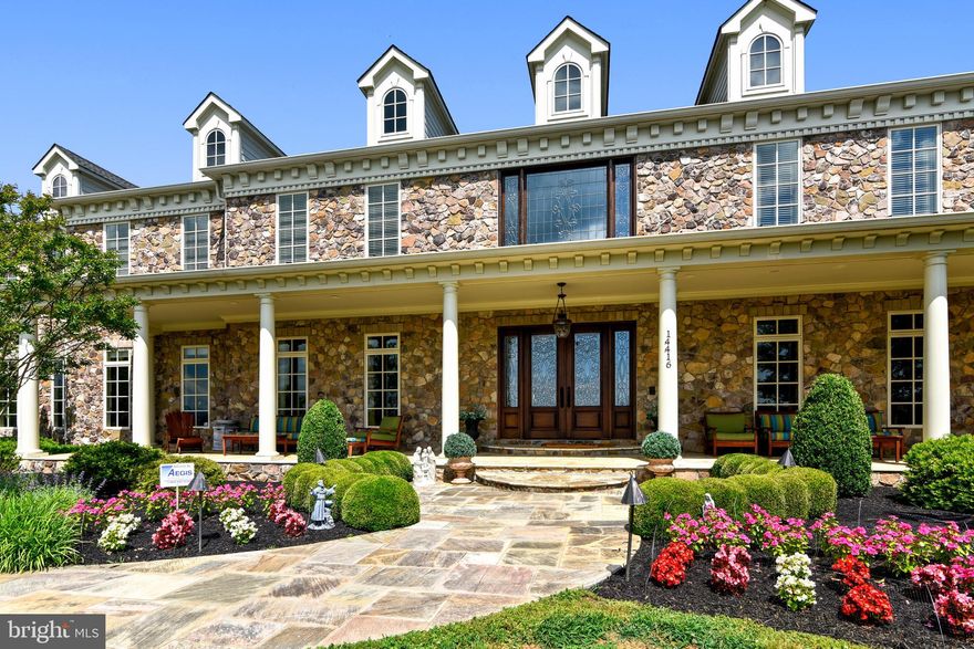 No trespassing, no drive bys, home cannot be seen from the road and has video surveillance. Virtual  showings possible for qualified buyers.  Stay-in-place now and staycation in luxury and comfort at this all inclusive property only 10 min from downtown Leesburg.  Your own fitness center, basketball court, baseball field, pool,  movie theatre, home school room, home office...it's all here! The 17 acre sophisticated retreat offers unparalleled indoor and outdoor living and is truly turnkey (furnishings can be available with acceptable offer). This is your chance to create a legacy property. For an aerial tour of the property, click Virtual Tour Very special offering combining the ultimate in luxury and lifestyle.  Custom built stone home offers 12,000 sq ft of finished space for entertaining and relaxing. Panoramic views of the Blue Ridge Mountains and surrounding valleys usher in a sense of peace and tranquility from the wide and welcoming front porch.  Step inside, and notice thoughtful design touches throughout, from the European oiled cherry flooring, to the eight foot solid cherry doors, detailed mill work, and views from every window.  Elevator service to all three floors (culminating next to a suitcase room in the lower lever for the travelers' convenience).  Residence has 5 bedroom suites, all include oversize walk in closets and en suite baths, as well as 3 half baths. This smart home has Crestron technology for the ultimate in convenience and security features.  A 45kw generator also offers peace of mind.The walk out lower level offers a theater, full wet bar, game room, rec room, and is even roughed in for a 2 lane bowling alley!  Entertaining around the custom rock carved pool is enhanced by the wide back veranda, pool house with bar/grill, and travertine patio.  The heated pool features dual rock slides, waterfall, and integrated fire features for that wow factor.What makes this property truly unique is the sports complex, nicknamed "The Barn". Nearly 5000 sq ft of conditioned space, with a regulation half court basketball court, auto pitching range, fitness room, bath/locker room... and right behind that, a full baseball field!  This building could easily be used for other hobbies as well.  Car collection (there's an RV sized garage door in place already), event or meeting space, corporate retreat, art studio, music space, and more!This extraordinary property could not be built at this price. Please note year built is not accurate in tax record. Home was finished in 2011.