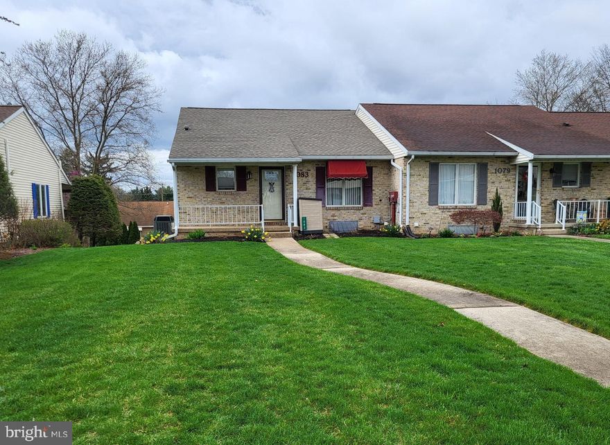 END UNIT TOWNHOME...Extra full kitchen & full bath on lower level!   Great opportunity!  Property has new roof, attached garage, multi-floor living space for two parties or in-law suite.  Immaculate, easy care exterior.  2 beautiful complete kitchens with newer appliances, updated baths!  Gorgeous hardwood floors in living rm/dining & bedrooms!  Earn additional monthly or help that family member with arrangements for joint care & cost sharing.  Enjoy covered rear balcony/deck!  Affordable Borough utilities avg $200 a month!  Excellent condition!  Convenient location, walk to park!  Truly unique property...ready to go for your future.