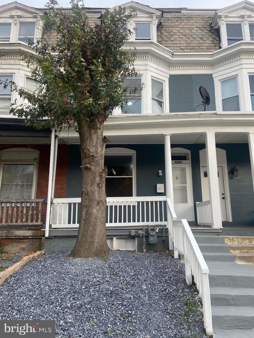 Welcome to this freshly renovated 5 bed, 1.5 bath townhome on a quiet street, includes off street parking with a privacy fence and swing gate, room for 2-3 cars. No mowing needed.  Make this home your own, brand new heating system installed, updated electrical work, new floors and paint throughout.  This home offers a spacious living room, accented by the gas- option fireplace and mantel.  Eat- in kitchen, all appliances convey.  Second floor full bath with brand new walk- in tile shower.  Second floor back bedroom has a bonus room.  Two additional bedrooms on the 3rd floor.  Brand new half bathroom or laundry room on first floor, owner will finish project to buyer's choosing.  Upon request, the seller will also fix minor issues and anything that is not working.  Schedule a showing today!