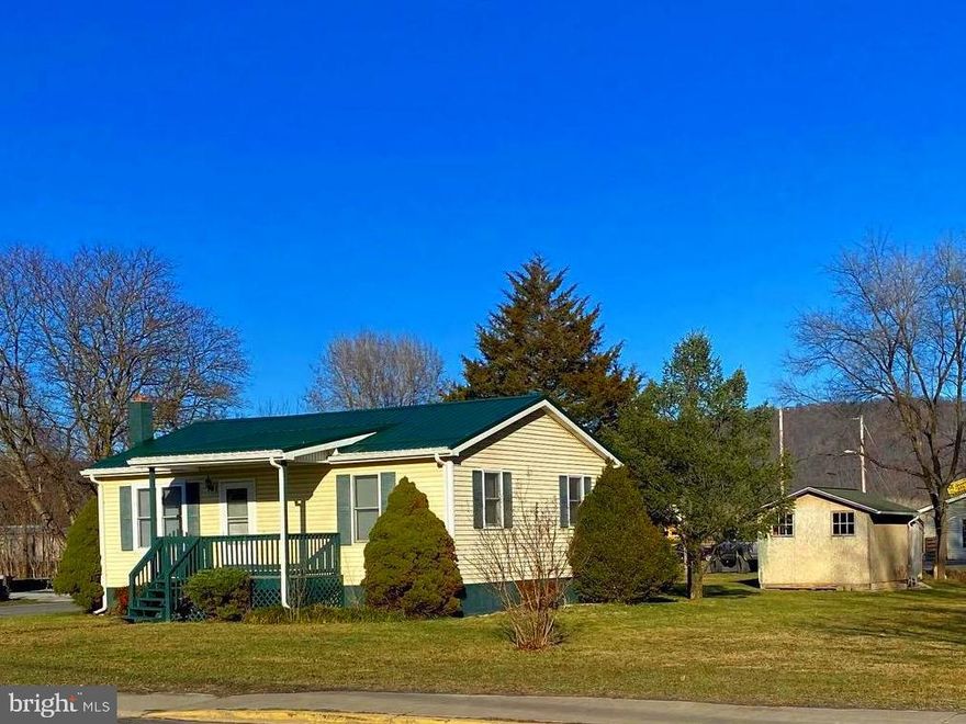 Make Your Life Simple and Enjoy More "ME" Time. This Quaint, Cozy Home Is In a Very Convenient Location.  One level living for down sizing or starting out. Big Level yard with room for garden, play area or pet space. Front porch and back deck included in your outdoor living.   Bonus of an Outbuilding fitted for your latest hobby or use as extra storage and a shed for your mower and gardening tools.  Johnson Run flows South of property. Listen to the relaxing sound of water or the frogs conducting an orchestra in the spring. Home is situated out of the flood plain.  The town of Petersburg screams charm and is known as The Home of The Golden Trout!   As you drive through town you will find shopping, restaurants,  hospital, town pool/playground, banks and a small airstrip. Cheap utilities. Convert into a small business, shoppe or hair salon. Location. Location. Location.  Give me a call to schedule your very own private tour.