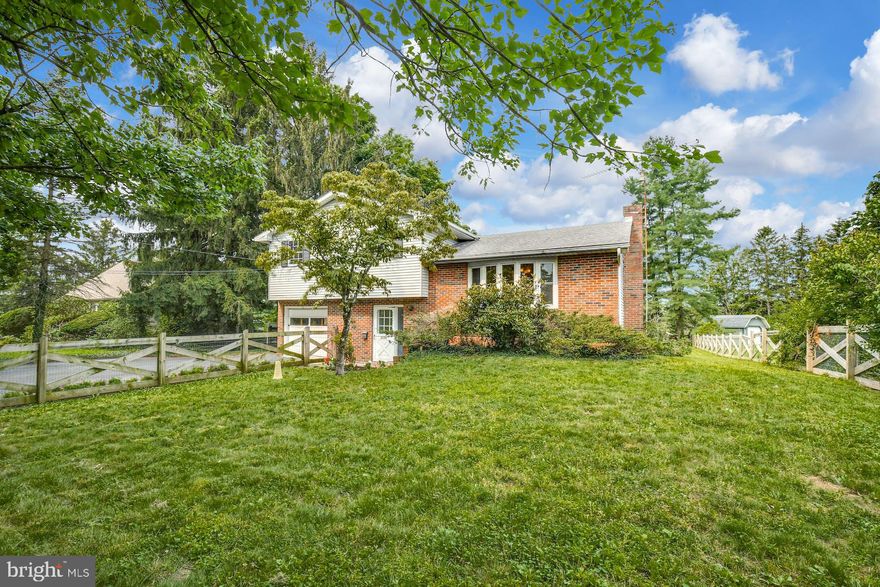 This sunny home offers a convenient Upper Bucks location and contemporary amenities. A delightful brick front home with a peaceful rural setting in the PALISADES SCHOOL DISTRICT, the half acre parcel includes a large backyard and mature landscaping. 
     New carpeting, hardwood floors and abundant windows highlight spacious rooms. The entry level is inviting with a family room, full bath and den. A cozy kitchen shines with wood cabinets, stainless appliances and lots of prep space. The nearby dining room opens to a screened porch for entertaining or whiling away lazy afternoons. Three bedrooms on the upper level include a primary with access to the hall bath. The spacious lower level basement with good ceiling height, workbenches, and built-in shelves awaits the next project.
    The large multi-level deck looks out over the fenced backyard and wooded acreage beyond. Enjoy the scenery year round from your own private corner of Bucks County.
Updated features include brand NEW HEATING AND A/C being installed Aug 2023.