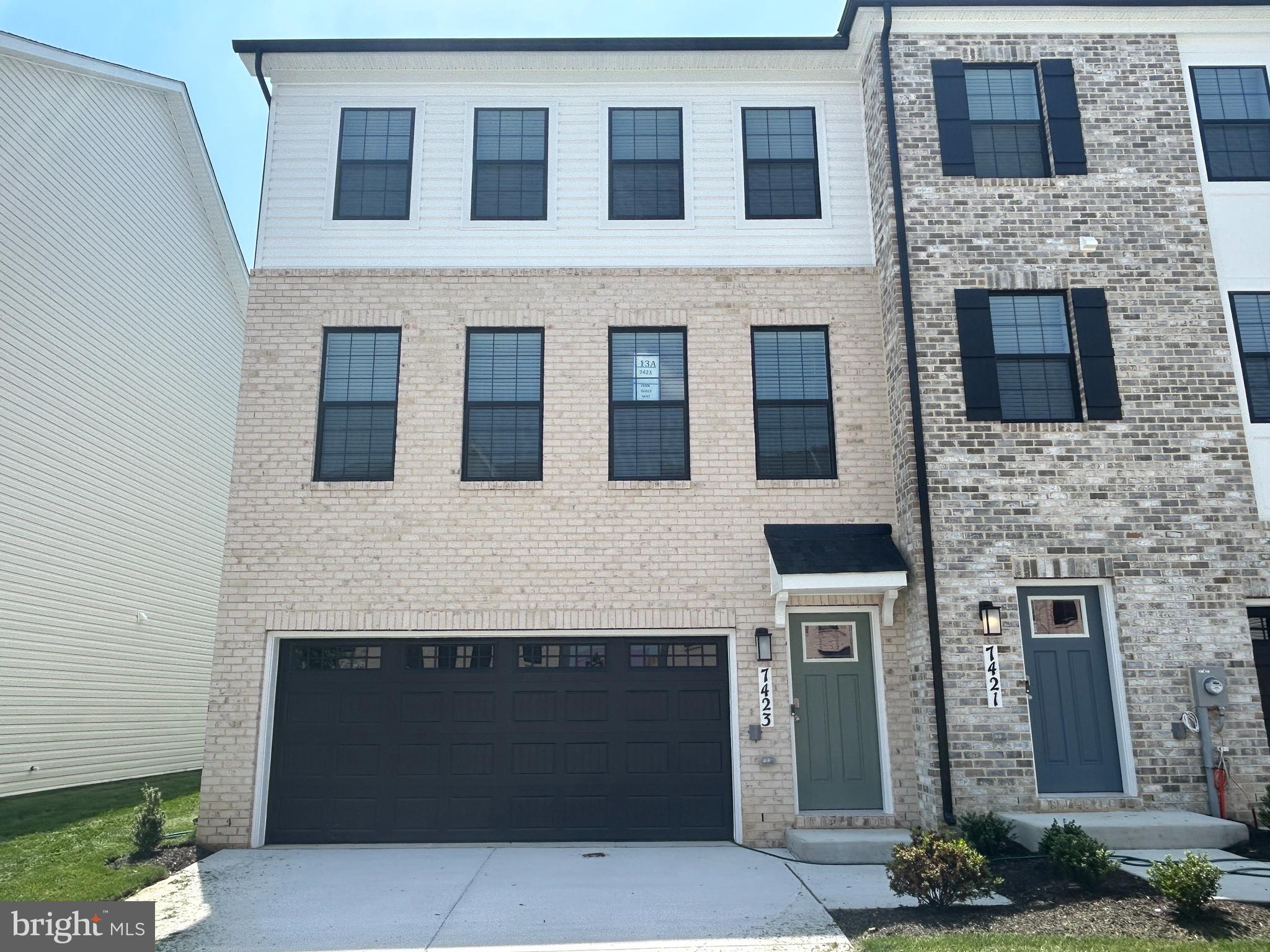 FULL BRICK FRONT END UNIT, MAY 2025 DELIVERY! Backing to trees, this end unit townhome features 3 bedrooms, 3.5 baths, a lower level den and INCLUDES a 12' x 10' DECK off of the kitchen. With a modern exterior and an open and spacious layout, this home has the perfect living and entertainment space for family and friends. Boasting over 2,208 sq.ft., this Regent floor plan offers the amenities of a single family home with convenient townhome living. The main living level offers an expansive island and upgraded grey cabinetry, quartz countertops and stainless steel Whirlpool appliances. Hard surface flooring throughout the entire home offer modern luxury and contemporary appeal. The third level features a luxurious primary suite with a generous walk in closet and a spacious primary double vanity bathroom. Two secondary bedrooms with spacious closets, upper level laundry, and hall bathroom are also included on the upper level. The finished lower level den is the perfect versatile space for both entertaining and living. Simplify your life with D.R. Horton's smart home technology which includes a keyless entry, Skybell (video doorbell), programmable thermostat to adjust your temperature from your smartphone and much more! Conveniently located across the street from tons of shopping and entertainment options. Incredible rates and closing incentive options available with the use of DHI Mortgage. Commuting and traveling are made easy with quick access to Routes 301, 5, I-495 and the Washington DC area.