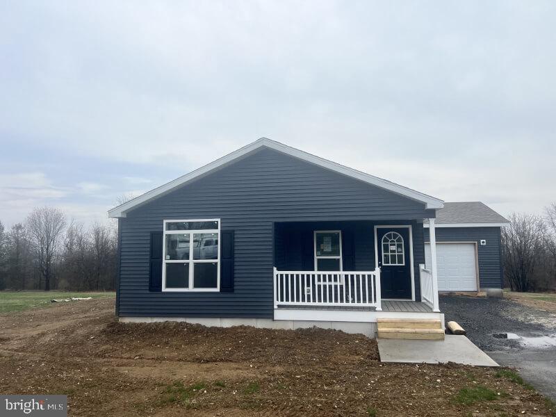 Brand new 3 bed, 2 bath home sitting on a large private corner lot. This home features an open floor plan that includes an oversized island with plenty of space for bar stools and a separate dining area for a full size table. The kitchen offers many upgrades from the marble look upgraded countertops, farmhouse sink, hidden pantry, upgraded appliances, recessed lighting and so much more. The master suite includes a walk-in closet and spacious bath with a double vanity, walk-in glass shower, comfort height toilet and extra linen cabinets. This suite also include French doors that open up to a back patio overlooking the large grassy lot. The attached one car garage affords additional storage and the oversized driveway will accommodate several cars. Call us today for more details!