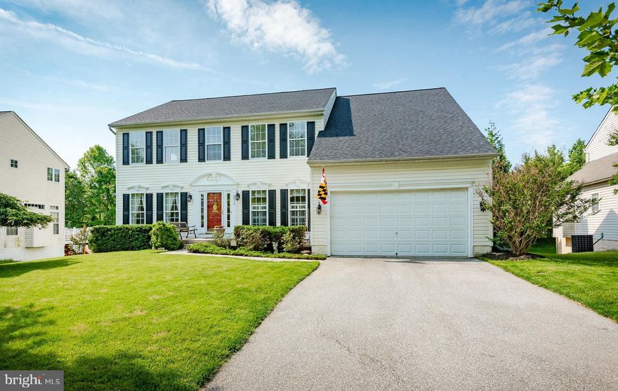 Pristine colonial is perfectly set on a gorgeous lot backing to trees and conservation area! Entertain in open chef's kitchen with granite countertops, stainless steel appliances, 42 inch oak cabinets, and morning room addition with vaulted ceilings and gorgeous stacked stone gas fireplace! Host summer gatherings on Trex deck & open back yard. The first floor has 9' ceilings throughout. Rare five bedrooms in upper level, all filled with natural light and generously sized. Owner's suite with walk-in closet and attached bath featuring corner soaking tub, walk-in shower, and double vanity! Fully finished lower level with rec room, game room, exercise room, open bonus space, and half bath. Lower Level has walkout access to patio & screened-in spaces. 2019 architectural shingle roof, leased solar panels with no payments due, rights will transfer to the buyer! This home is move-in ready today!