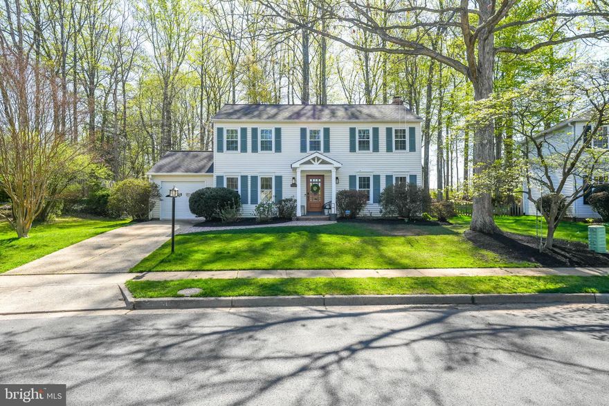 Welcome to this exquisite home in sought-after Lake Braddock, tucked away on a quiet culdesac on .56 acres. The gourmet custom kitchen is truly the heart of the home. It's a chef's dream, showcasing an Italian Ilve range inset into the built-in nook, quartz countertops, stainless steel appliances, a large center island, pantry, and opens up to the dining room, complete with wood trim accents and a bar with wine fridge, cabinets, and open shelving. The inviting family room with newly custom-built fireplace, adorned with stucco and limestone, walks out to the large screened in porch and deck to enjoy the beauty of the yard. Living room has wood accent wall and coat closet. Powder room on main level and white oak hardwood flooring throughout. Upstairs, find the primary suite, boasting a renovated bathroom with marble glass stall shower, double sinks with vanity seat, and a sizable bedroom with an orgainzed walk-in closet, as well as a secondary closet. Three other generously-sized bedrooms upstairs and the full bath that was redone with marble and stone flooring, a glass shower, and double sinks. On the lower level, there is a fun rec room space, as well was the fifth bedroom and a full bathroom. Large laundry and storage. Welcoming entry with a stone front walkway leading up to the portico and wood and glass front door. The fully fenced backyard provides the best entertainment with a fire pit area with string lights, a zip line through the trees, and a trampoline. Storage Shed and Attached Garage. Fireplace Renovation 2025. New Roof with Gutter Guards 2022. Front Door 2023. Hall Bath Renovation 2022. New Electrical Panel with EV Charger 2021. Vinyl Wrapped Trim 2021.  Kitchen Renovated 2021. Primary Bath Renovation 2019. Water Heater 2018. Windows 2014. Walk to the lake at Lake Braddock and enjoy the serene, 2 mile walk around, stopping at one of the three tot lots. Catch and release fish or take out your kayak. Two community pools in the neighborhood with an active swim team and pickleball. Fun community Labor Day carnival. Lake Braddock Secondary School pyramid. Quick commuter convenience with easy access to 495, Fairfax County Parkway, the VRE, and within walking distance to the bus that will take you right to the Pentagon. Owner/Agent.