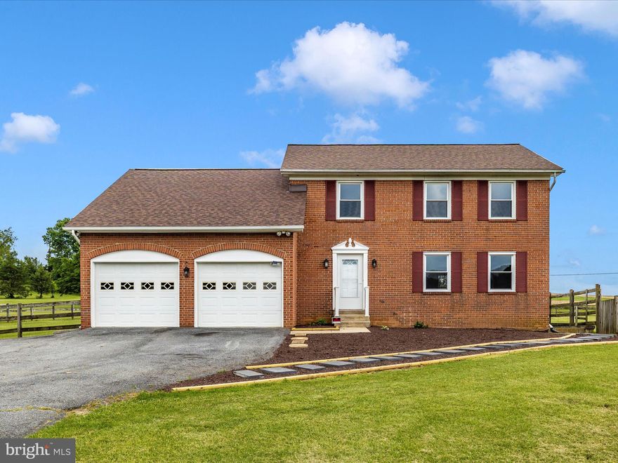 Welcome to paradise! Renovated home on four acres. Located in a cul-de-sac. Includes a detached two bay out building. Perfect for all your projects. Has the feel of being secluded and very private but minutes to commuter routes and downtown Frederick. Lower level living area with a washer dryer hookup. Very spacious floor plan. Four spacious bedrooms. All with ceiling fans and recessed lighting. The washer dryer is also on the bedroom level. Attic storage from one of the bedrooms. Kitchen includes a  center island, double sink, pantry and closet for cleaning tools and supplies, access to the deck.  Brick hearth and fire place in the family room off the kitchen. A living room, dining room and half bath complete this level.