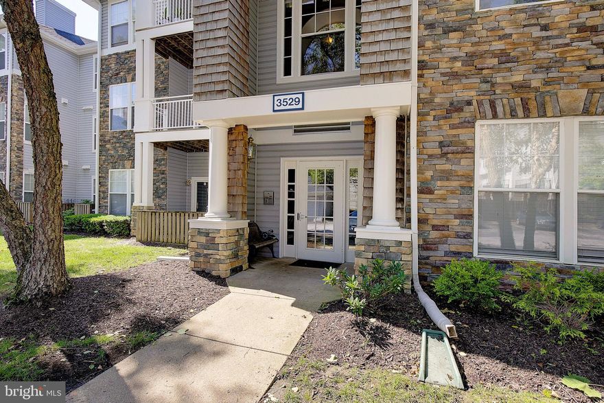 Just Listed and Ready for Its Next Owner! This meticulously maintained ground-level 2-bedroom, 2-bath condo in the highly sought-after Russett community offers the perfect combination of privacy, convenience, and comfort. Backing directly to peaceful woods, this extremely private unit provides serene views and a tranquil setting rarely found in condo living. With ground-level access and a recently renovated building featuring elevator service, this home is designed for easy, low-maintenance living.

Inside, you'll find a spacious and inviting living room with a cozy electric fireplace, perfect for relaxing evenings at home. The oversized primary suite features a large walk-in closet and private full bath, while the generously sized second bedroom is conveniently located near the second full bath ideal for guests, roommates, or a home office.

Additional highlights include a brand-new A/C unit and access to Russett's outstanding community amenities, including pools, parks, walking trails, tennis courts, and recreational areas. Conveniently located near major commuter routes, shopping, dining, and entertainment, this move-in-ready condo offers an exceptional lifestyle in an unbeatable location.

Freshly reintroduced to the market and ready for showings don't miss your opportunity to own this beautiful turnkey home in the heart of Russett!