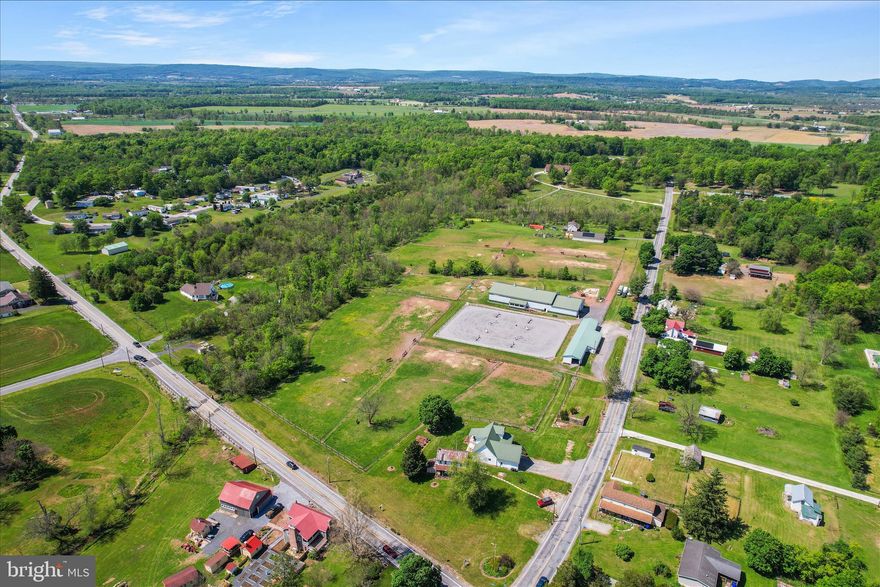 What an opportunity to move right into one of the loveliest equestrian properties in Gettysburg, PA!  Only 1 mile off Route 15,  this property offers a beautiful home and  immediate business potential with boarding/training/lesson facilities offering  22 stalls with rubber matting, tackroooms, restroom,  laundry, wash and grooming stalls, feed room, indoor arena (120' x 60'), outdoor ring with all weather footing (225' x 150') ample hay storage,  and 10 acres of fenced pasture with Bar-Bar-A  frost free automatic waterers.   There is a climate controlled viewing  lounge/horse show office that overlooks the indoor and outdoor arenas.  As a horse show venue, this farm is the favorite horse show venue of many local equestrians.

Lovely Cape Cod Home was built in 2011.  Views of the farm from the kitchen and living room windows.   First floor laundry.  Entire home freshly repainted.    First floor primary suite and two bedrooms and full bath upstairs.   Space above the garage could also be a third upstairs bedroom.
