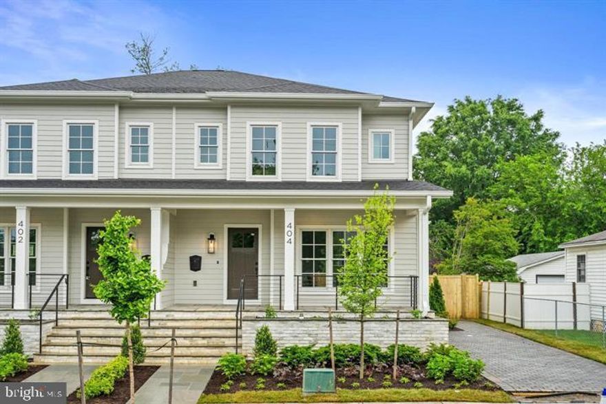 Welcome home to Del Ray's newest home by Classic Cottages! This custom built home (left side of the duplex) boasts 4 bedrooms, 4.5 baths with a covered front porch, fully fenced yards and 2 off street parking spaces. The main level includes a formal dining room with attached butler's pantry, office with tons of natural light, mudroom with side entrance from driveway, well appointed kitchen with JennAir appliances and breakfast nook opening to a spacious great room. The bedroom level includes the primary bedroom with two walk in closets and a luxurious primary bath. There are two ensuites on the bedroom level and a laundry room. The fully finished basement includes a wet bar, exercise room and guest bedroom and bath.  Photos represent right side of duplex - each have the same floor plan but different finishes.