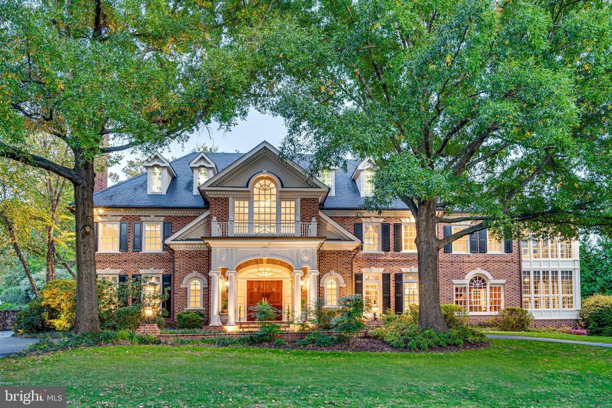 Breathtaking Georgian Manor sits at the top of the rise on prestigious Ballantrae Farm Drive, one of McLean’s most beautiful streets. Distinguished from outside by its stately portico, two sunrooms, and Palladian and dormer windows, this impressive residence is a study in grand architecture and timeless aesthetic appeal. Arrive by way of the gracious circular drive and prepare to be enveloped in an easy elegance. Such flow in this floor plan! The Entry Vestibule, with two closets, gives way to an enchanting Foyer with marble floors and sweeping stair. Formal spaces flank the foyer and monumental millwork, and plasterwork, throughout the house ground, and unify, the perfectly proportioned rooms. A celebration ready Dining Room, with fireplace and custom, lighted cabinetry, is a gathering spot beyond compare. A lovely Living Room opens to the study where fully paneled cherry walls, and built-ins, invite quiet reading or more serious pursuits. Don’t miss the coffered ceiling, fireplace and wet bar in this work from home wonderland. When it’s time for a rest period, step into the Sunroom, with floor to ceiling windows, to be calmed in a warm and cozy cocoon. The heart of the house Family Room is wrapped in pine millwork and features a fireplace and skip trowel walls; a classic and time honored custom finish. Open to the expansive Family Room is the dramatic Kitchen with Quaker Maid cabinetry, Viking, SubZero and Bosch stainless appliances, butler’s pantry, breakfast room with soaring ceilings and windows trimmed in pine.
A remarkable retreat on the upper level is the sumptuous Owner’s Suite with fireplace, two marble baths, a sauna and access to the Sunroom. Four additional ensuite Bedrooms are also found upstairs. And, if you’re ready for fabulous fun in an at-home fantasyland, check out the Playroom with hand painted mural on this level.
The walk out Lower Level is a hang out space with zones for every kind of activity. Watch a game or movie in the Theater, sit by the fire, set up billiards or ping pong in the Rec Room or work up a sweat in the Exercise Room. Serious storage space is also found on this level.
Majestic in its architecture and remarkable in its appointments, 1295 Ballantrae Farm Drive is the essence of refined in a remarkable setting. Just moments to the Chain Bridge and GW Parkway into DC, plus direct access to Tyson’s Corner and the Toll Road by way of Dolley Madison Boulevard.

Impressive and Intimate, this Magnificent Manse in aLegendary Location is a Washingtonian’s Wish Fulfilled!

LET IT TAKE YOUR BREATH AWAY.

DARE TO DREAM.