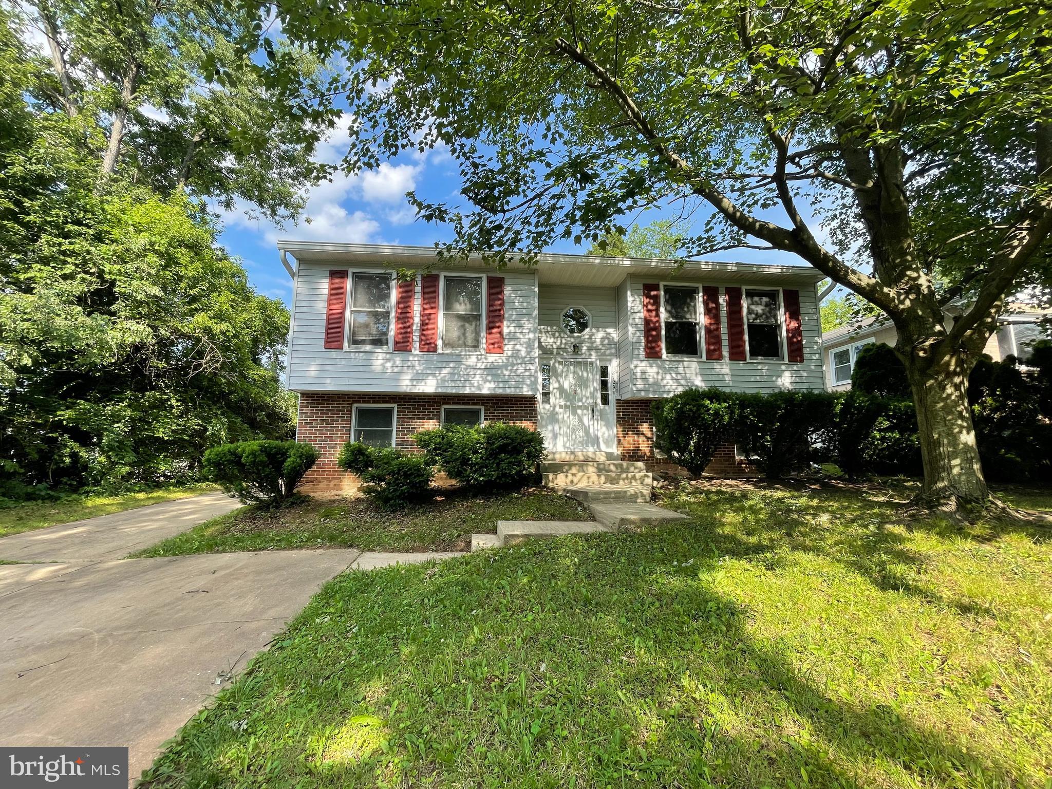 Welcome to this beautiful Split Foyer home with 5 bedrooms and 3 full baths in a desirable location of College Park! Walkable to University of Maryland and National Archive II! Updates include newly re-stained kitchen cabinets, new floorings installed 2019, new roof 2019, new water heater 2024 and fresh paint throughout the house and deck. Over 2000 SF of total finished living area on both levels. Upper level features 3 bedrooms, 2 full baths, spacious living room and large kitchen with plenty of counter space and cabinets. Lower level has 2 large bedrooms, 1 full bath, recreation room and laundry room. Basement with walkout stairs to the backyard. Long driveway for lots of parking spaces. The UMD shuttle bus stops are only a few minutes away by foot. Metzerott Plaza Shopping Center is about a 5 minutes drive. Convenient location near major routes, highways, restaurants, University of Maryland and National Archive II. Move-in Ready for owner occupants or rental investors!