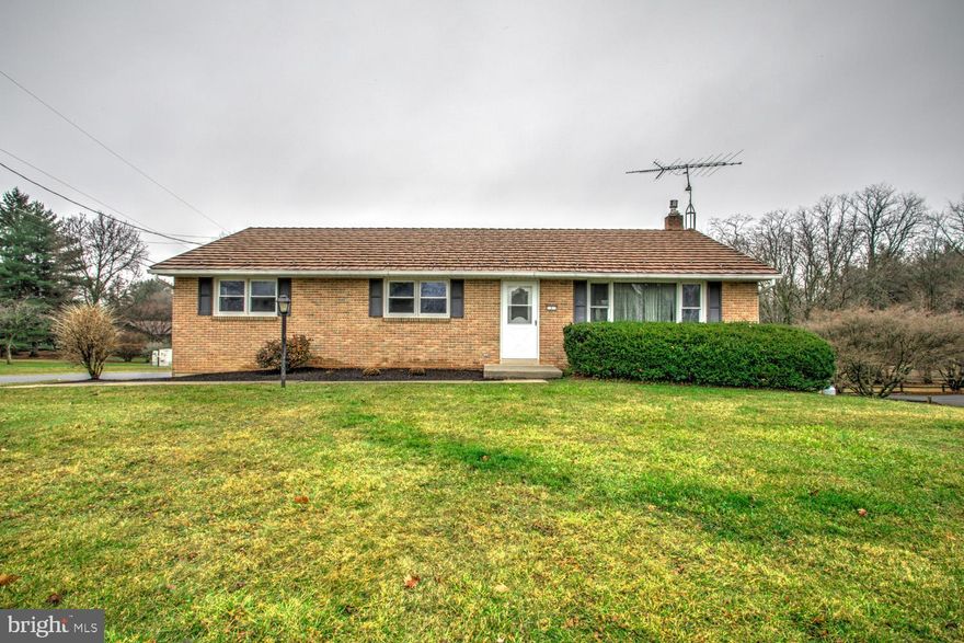 PRIME LOCATION for this solid home on almost a half acre lot, featuring a formal living room and a family room on the lower level with a propane fireplace and sliders that walk out to the ground level. Spacious kitchen (new dishwasher after pictures taken!) and dining area, and 3 nice sized bedrooms. Large closets throughout and 2nd full bath on the lower level. Access could be added from 2nd full bath/laundry to family room with a bit of sweat equity... but it would be well worth it! Replacement windows, fresh coat of paint, metal roof, 2 sheds are just some of the features of this home! Soooo much potential! Call today for a private showing and make it your own!!