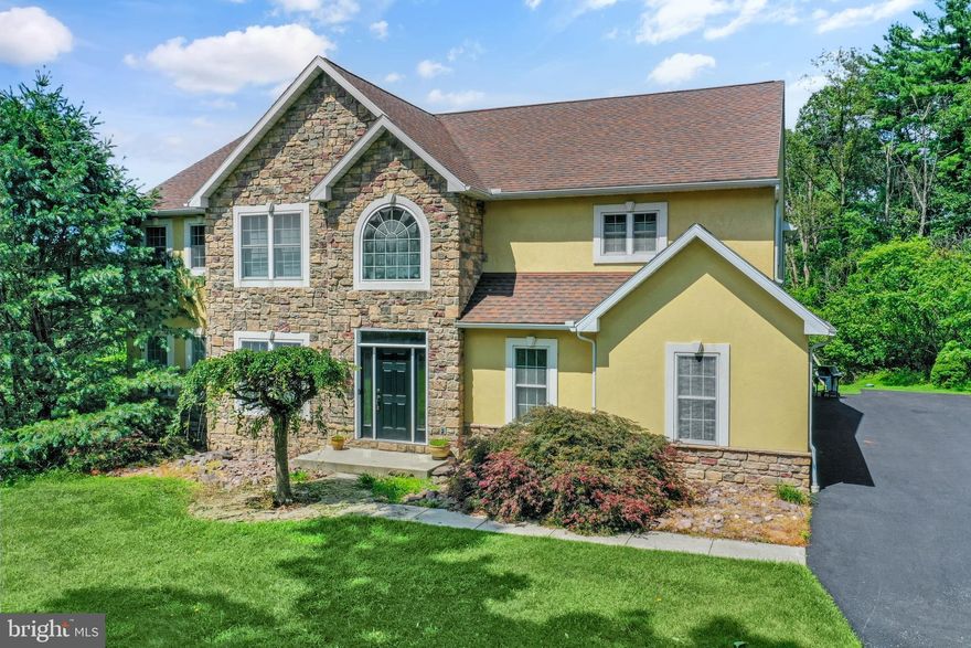 Welcome to 2 Forest Road, a beautifully maintained custom-built home tucked away on a private lot in the Governor Mifflin School District. This 4-bedroom, 3.5-bath residence offers comfort, privacy, and incredible potential for flexible living.

Step into the spacious foyer and you’ll immediately feel the warmth of this home. To the left, an elegant formal dining room sets the stage for memorable gatherings, while the expansive living room features a cozy gas fireplace and ample space for everyday relaxation or entertaining. The heart of the home is the well-appointed kitchen, complete with abundant cabinetry, propane cooktop, a large walk-in pantry, and a sunny breakfast nook that overlooks the peaceful backyard.

Upstairs, the generously sized primary suite boasts two walk-in closets and a private en suite bathroom with a private toilet room, and convenient access to the second-floor laundry—also accessible from the main hallway. Three additional spacious bedrooms each have ample closet space and  provide plenty of room for family, guests, and/or a home office setup. There is a full hall bath with private bathing area.

The finished walkout basement offers two large open areas with endless possibilities—recreation room, home gym, or even an in-law suite. One area features durable laminate flooring and is already plumbed for a kitchen installation. A full bathroom with a stall shower adds functionality and convenience.

Car enthusiasts will love the oversized 44’ x 21’ garage, complete with four wide doors for easy access and ample storage. The home is also equipped with a generator to keep essential systems running during unexpected outages.

Situated on a quiet cul-de-sac and surrounded by natural beauty, 2 Forest Road offers privacy. Come explore the possibilities of this exceptional property! The seller is appealing the taxes.