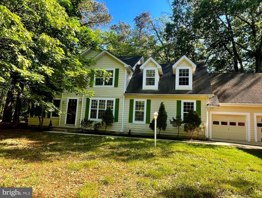 Wow!! Beautiful!! Updated !! Colonial. Located in sought-after SWAN POINT on the Potomac River,  Five (5) Bedrooms, Fully updated 3.5 Baths . Master bedroom with Full bath and a Domme 67 in. Flatbottom Freestanding Non-Slip Soaking Bathtub and Shower. Walk-in closet. Ceramic tiled flooring in all bathrooms. Beautiful and Elegant plank Floors through out and carpet in all bedrooms.  Upgraded Kitchen with stainless steels appliances. Newer Cabinets, Newer island and Corian Countertops.    The open-concept kitchen flows effortlessly into a warm and inviting family room featuring a cozy gas-log fireplace, ideal for entertaining. 
 A fully finished addition of 22X24 Sq. Ft. perfect for an In-Law Suite with a full bathroom or a private Exercise Room.  Relax at the beautiful large deck, an addition to your outdoor living space.  Nestled on a serene 0.37-acre lot. and an abundance of natural light.  Attached two car garage with a private driveway large enought to fit 5 cars.  A wide range of community amenities, including a beach, marina, boat dock and ramp, golf course, basketball and tennis courts, outdoor pool, playgrounds, walking and jogging trails, and picnic areas.   Seller will appreciate settlement at the title company of seller's preference.