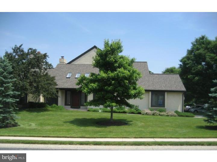 Located on a very large corner lot, this wonderful townhome is in a private setting. The spacious entry foyer has a tile floor, soaring ceilings and skylights and leads to a large living room with a fireplace, cathedral ceiling and French doors opening to a new deck. The formal dining room is adjacent to the kitchen with Jenn-Air & Sub Zero appliances and breakfast room. The bright den offers built-ins, cathedral ceiling and skylights. The first floor master suite includes a large walk-in closet and master bath with Jacuzzi tub, large shower and single vanity. Laundry room on main level with new washer and dryer. Two very large bedrooms and a full bath are on the second floor. A two car garage with inside access and a full basement with lots of storage complete this exquisite home. Short term rental available.