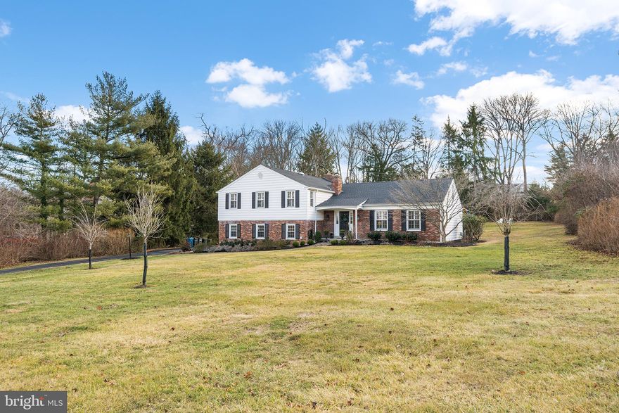 All offers are due by Friday January 10th at 2:00 PM!  Boasting over $200,000 in upgrades and improvements, this beautifully maintained, turnkey home sits on a scenic loop just one block from T/E’s Beaumont Elementary and popular Hilltop Park. From the side driveway, a new, professionally landscaped Belgium block walkway lined with Tru-Scapes® lighting leads to the cozy front porch. Inside you’ll find updates and amenities galore, including new and refinished hardwood floors, recessed lighting, neutral paint and replacement windows outfitted with custom plantation shutters. Every bathroom in this pristine home has been renovated as well, including the primary ensuite! Just off the light-filled foyer sits a warm and welcoming living room with crown molding and large windows framing the sprawling front yard. A cased opening leads to a sunny dining room with French door access to the rear patio and yard. Steps away you’ll find a newer eat-in kitchen with center island, new hardwood floors, stainless steel appliances and plentiful cabinetry. Glass sliders conveniently connect the breakfast area to the expansive rear greenspace. More space awaits on other side of the foyer, where a short flight of steps brings you to a large family room with pellet stove fireplace and new hardwood floors. Beyond the family room sits a brand-new, tastefully finished mudroom with slate flooring and custom cubby storage, a renovated powder room with high-end fixtures and finishes and a replacement side door. A new (relocated) laundry room with custom cabinetry and access to the attached, two-car garage complete this immaculate level. Upstairs you’ll find a lovely primary suite with renovated ensuite full bath featuring marble flooring and a shower with frameless glass door. The three spacious secondary bedrooms on this floor share a superbly renovated full hallway bath with marble flooring and a custom vanity. A large attic space—accessible from the second-floor landing—offers plenty of storage and potential for additional living space if desired. Outside, the flat, one-acre lot features a tree lined perimeter with endless greenspace to lounge and play plus a brick patio and renovated storage shed with custom shelving & electricity. Downtown Berwyn, Newtown Square and Devon Yard are just minutes away, along with award-winning T/E schools and Hilltop Park’s sports fields, walking trails and picnic areas. For your peace of mind, this home boasts a whole-house generator and new roof with warranty. Don’t delay; make plans to tour this Main Line gem today!