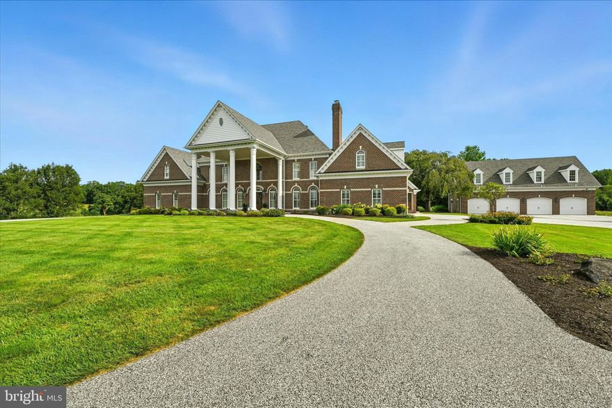 This spectacular all-brick custom-built home with beautiful portico & circular driveway is nestled on over 10 acres overlooking beautiful scenery in a private setting! You will immediately notice the impeccable craftmanship & care taken to build it. It has been meticulously maintained & thoughtfully upgraded to meet the needs of today's discerning buyer. Gleaming solid hardwood floors flow throughout all levels complementing the design character. The formal living room offers a cozy retreat anchored by a fireplace that promises warmth on chilly evenings with your guests. The dining room with fireplace across the foyer accommodates both intimate dinners & festive gatherings while the gourmet kitchen is a chef's dream!!  This kitchen features Woodmode cabinetry with pull out drawers, two islands with seating & additional workspace making meal prep & entertainment effortless. Granite counters, stainless appliances including gas cooking, a double oven, pot filler & reverse osmosis water system are all to make the cooking experience enjoyable! It also features a custom-built china cabinet to display your serving pieces, a table area, walk-in pantry, & a laundry/mudroom attached to add to the appeal. Entry from the two-car attached garage as well, plus french doors to access the all brick patio. The spacious great room joins the kitchen & offers a fireplace and french doors opening to view of the backyard & inground heated swimming pool, hot tub & pool house with convenient 10th bathroom. Walk down the hall from the great room & you will see the spectacular office covered with raised panel molding & yet another fireplace plus access to the outside patio. At the end of the hallway is a large family room with separate game room area, perfect for entertaining large gatherings & includes a small bar with cabinetry & granite countertops, a fireplace & a powder room. As you leave the main floor & head upstairs to the second level, the owners' suite is a sanctuary unto itself, complete with an owners' sitting room with fireplace and two bathrooms, one with a jacuzzi tub/shower and one with a walk-in shower and soaking tub.  Off of the owners' suite there is a french door to a private balcony. Three more spacious bedrooms on this level all with personal bathrooms, tastefully finished with modern fixtures & timeless design elements. The spacious fifth bedroom on the third floor features skylights, updated bathroom, walk-in closet & a separate HVAC system. The attention to detail is evident in every room, reflecting pride of ownership & a commitment to quality. The basement has a finished vaulted safe room, unfinished area for storage or finishing of your liking & a full bathroom. Step into your backyard oasis-your private escape from the hustle & bustle of daily life. Here the expansive patio offers the ideal setting for outdoor entertaining, barbecues, family gatherings & summer celebrations by the in-ground heated pool & hot tub. The pool house is convenient with a half bathroom & cabinets with granite countertops, perfect for small party set up. This is where memories are made! The brick four car detached garage has red Moduline cabinetry, newer garage doors and openers. The upstairs is finished with recessed lighting, ceiling fans & a separate HVAC. A spacious driveway leads to the garages or front of the home with plenty of parking for all to enjoy. The serene property is ideally located in Harford County near the Baltimore County line & accessible to I-95. Enjoy proximity to top rated schools, parks, shopping centers & dining destinations. Close local events, farmers markets, & cultural attractions add to the richness of life here ensuing there is always something to discover. This picturesque home & its property are sure to impress even the most discerning buyer, offering a space where life unfolds beautifully. Take the next step & make this remarkable property yours. Welcome home!