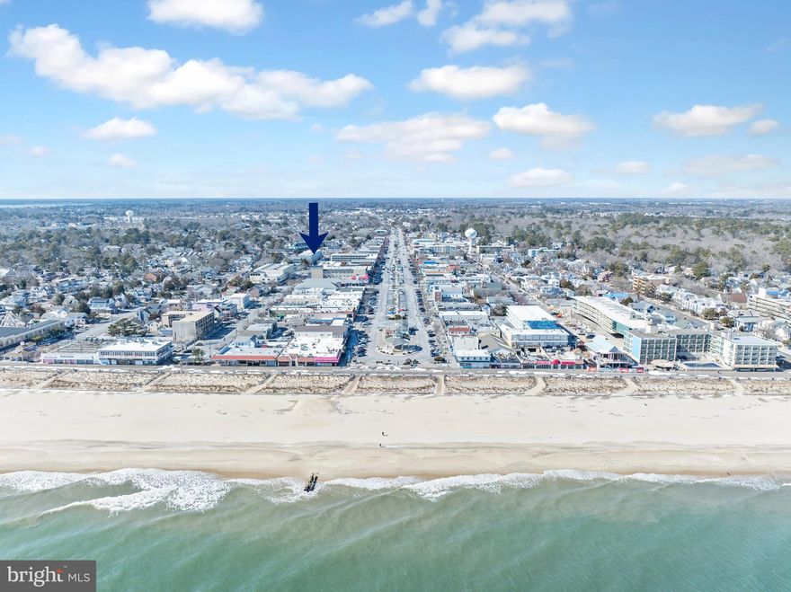 Rare Unit in The Wilmington. Welcome to your beach condo in the downtown Rehoboth, just a short walk to Rehoboth Beach Board Walk, shops, restaurants and more! Inviting 2-bedroom, 2-bathroom garden-style apartment offers a warm and cozy atmosphere, perfect for relaxation and entertaining. Step inside to discover an open floor plan that seamlessly connects the living and dining areas, enhanced by plush carpeting and ceiling fans for comfort. The galley kitchen is equipped with appliances, including a dishwasher, microwave, and electric range, making meal prep a breeze. Enjoy your morning coffee on the private balcony, or take advantage of the community amenities, including a sparkling outdoor pool and beautifully maintained common grounds. With assigned parking and an elevator for easy access, convenience is at your fingertips. Located in a vibrant neighborhood, this condo is just moments away from local shops and dining options, which makes renting this home out short term a great possibility. Experience the perfect blend of comfort and community living in this delightful property—your ideal retreat awaits!  Water, Sewer, and Trash are included in the HOA fees. Condo comes fully furnished, which means its ready for you to move in and enjoy!