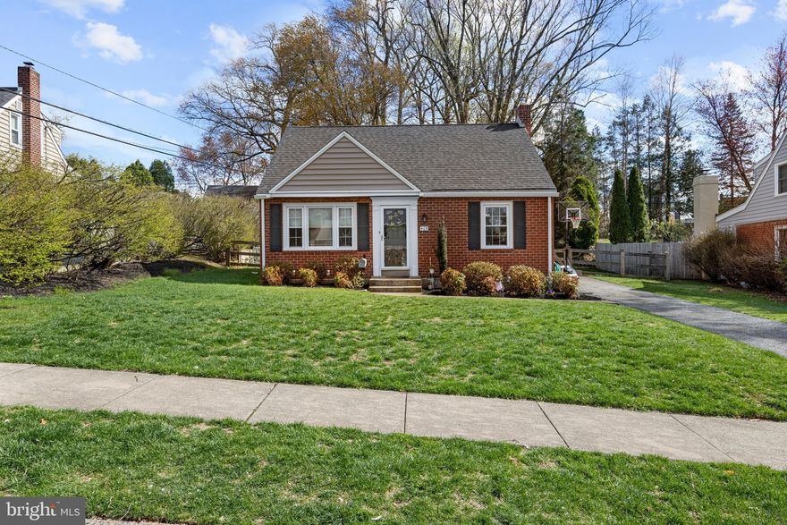 Fall in love with this absolutely gorgeous 3-bedroom, 2-full bathroom Cape Cod in Haverford Township's sought-after Paddock Farms. The main level's open floor plan flows seamlessly, showcasing beautiful hardwood floors and a fabulous gourmet kitchen. This culinary haven features custom Goebel cabinetry with illuminated glass displays, stainless steel appliances including a double oven, and stunning white marbled quartz countertops with a breakfast bar. The adjacent dining area is illuminated by a charming farmhouse chandelier. Enjoy the convenience of a first-floor bedroom and full bathroom. Upstairs, discover a spacious primary bedroom, a second full bathroom, and a generously sized third bedroom. Recent upgrades include a new roof and siding (2019), a custom kitchen (2019), a water heater (2019), and a shed (2015). Step outside from the kitchen to a huge, fenced backyard – perfect for outdoor living. Located in the award-winning Haverford Township School District (Coopertown Elementary) and within easy reach of Merion Golf Course, the YMCA, Paddock Park, shopping, and local eateries.