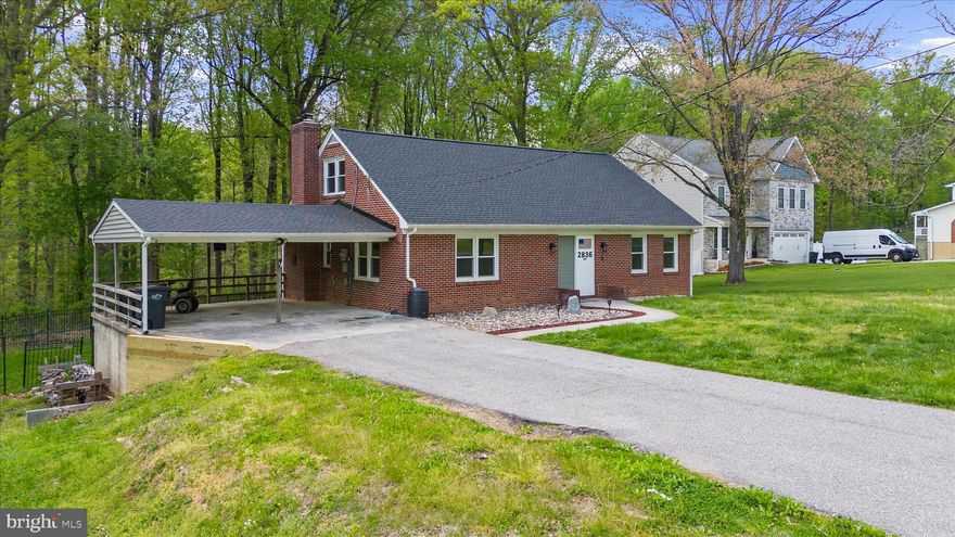 Fully renovated and move-in ready, this brick four-bedroom Cape Cod sits on 1.6 private acres in Windsor Mill with no HOA, no neighbors crowding the fence line, and no compromises on space. New roof. New quartz countertops. Updated bathrooms. Gleaming hardwood floors throughout. The large eat-in kitchen open to the dining room anchored by a wood stove which will actually get used. Two bedrooms and a full bath on the main level. Upstairs, two more bedrooms, both with full headspace, and a second full bath.
Step out to the screen porch and you already feel the shift. The fenced rear yard gives you a defined outdoor living space. Beyond the fence, a cleared area with firepit leads into thick woods that run to a creek. This is not a token backyard, it's the real deal.
Plenty of storage space in the full basement with bathroom rough-in. Two-car carport. Room to breathe inside and out.
Brick construction, new roof, quality renovation throughout, 1.6 acres, two-car carport, full basement with bathroom rough-in. Woods and a creek at the back of your own property. No HOA telling you what to do with any of it. Come see what quiet actually feels like.