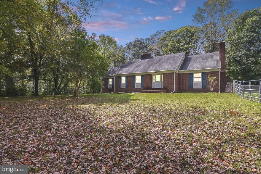 Opportunities like this don't often come around. This property is sure to wow you. As you pull up the paved driveway, there are 2 large sheds for storing all the toys and tools you can. This property is a true gem that will take you back in time. The kitchen is large and awaiting hosting the gatherings with friends and family. It has an eat in area in the kitchen, 2 stoves, tons of counter space and cabinets. With the wood burning stove, you will keep warm all winter. There is a large living room to have your game-day parties! Built in shelves with glass doors are in the office or formal dining and transport you back with their vintage feel. You have the option of primary on entry level or upstairs. All of the bedrooms are large. This home does not lack on the storage space. Your yard boasts a Coy-Pond for you to fill with life, fig trees, peach trees and an herb garden that will have a holistic enthusiast, or canning enthusiast swooning.  The basement has storage shelves galore and a finished space for workout room, hobby room, or office. 5.99 acres gives you the privacy you want, with the location giving you the convenience you need. You must see this property!!