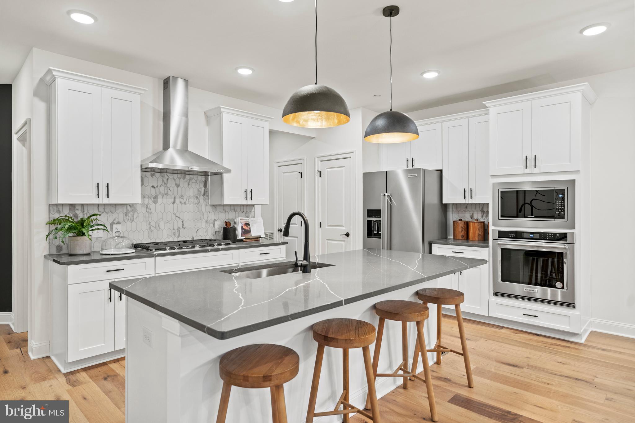 Say hello to your new home, just 15 minutes from Wilmington in the top-ranked Garnet Valley School District! Walkable to Whole Foods and Glen Eagle Square, this beautiful Ashton two-story townhome by Pulte Homes includes three bedrooms, two full baths, a powder room, and two car garage! The main level offers a kitchen with a large center island overlooking your dining area and gathering room, perfect for entertaining. The optional sunroom extension adds about 100 sqft to each floor and is the perfect space to unwind and relax at the end of the day. The second level features a spacious primary bedroom with oversized closet and en-suite. Additional features include two bedrooms, full bath and laundry room. Spring Lake is located in the award-winning Garnet Valley School District! Spring Lake connects with Glen Eagle Square where you can walk to Whole Foods, Harvest, and many high-end retail shopping! Tour our model home today!