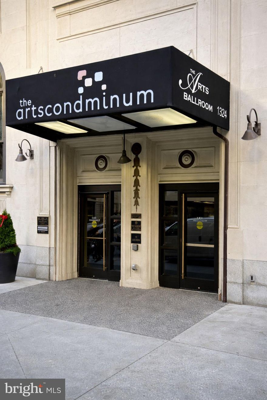 An elegant city pied-à-terre in the heart of Philadelphia’s Avenue of the Arts. Located on the 10th floor of the historic Arts Building, this beautiful efficiency condo offers refined urban living, dramatic city views, and one of Center City’s most culturally rich addresses.

Thoughtfully designed for one, the residence features a sleek, modern interior with newer flooring throughout and a contemporary kitchenette outfitted with stainless steel appliances, including a refrigerator with ice maker, microwave, stove, deep sink, custom cabinetry, and glass backsplash. Central air conditioning and an efficient, well-planned layout maximize comfort and functionality, while the elevated floor provides light, views, and a sense of privacy rarely found at this price point. Offered furnished with high-quality pieces, the condo is truly move-in ready.
The Arts Building is a full-service, professionally managed high-rise with a 24-hour attended lobby and security, on-site management office, fitness center, community room, bike storage, and common laundry facilities. All utilities are included in the condo fee, creating a simplified, low-maintenance ownership experience.

Step outside and you are immersed in the cultural core of Philadelphia. The Kimmel Center, Academy of Music, Broad Street theaters, City Hall, and Reading Terminal Market are all just blocks away, along with countless restaurants, cafés, and shops. SEPTA, PATCO, and regional rail lines are nearby, making access throughout the city and beyond effortless. With a Walk Score of 99 and Ride Score of 100, daily life here is defined by convenience.

This residence is ideally suited for a professional, student, or city dweller seeking a refined and efficient home base. Its proximity to Jefferson makes it especially appealing as a long-term investment opportunity, perfect for parents purchasing a secure, private residence for a student, with the added benefit of strong future rental potential.

A rare opportunity to own a polished, intelligently designed city retreat in one of Philadelphia’s most iconic and enduring locations, where culture, convenience, and timeless architecture meet.